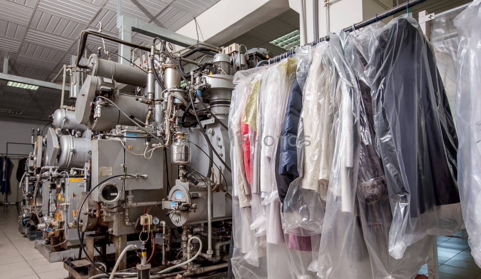 Dry Cleaning. Image of modern equipment and clothing on hangers