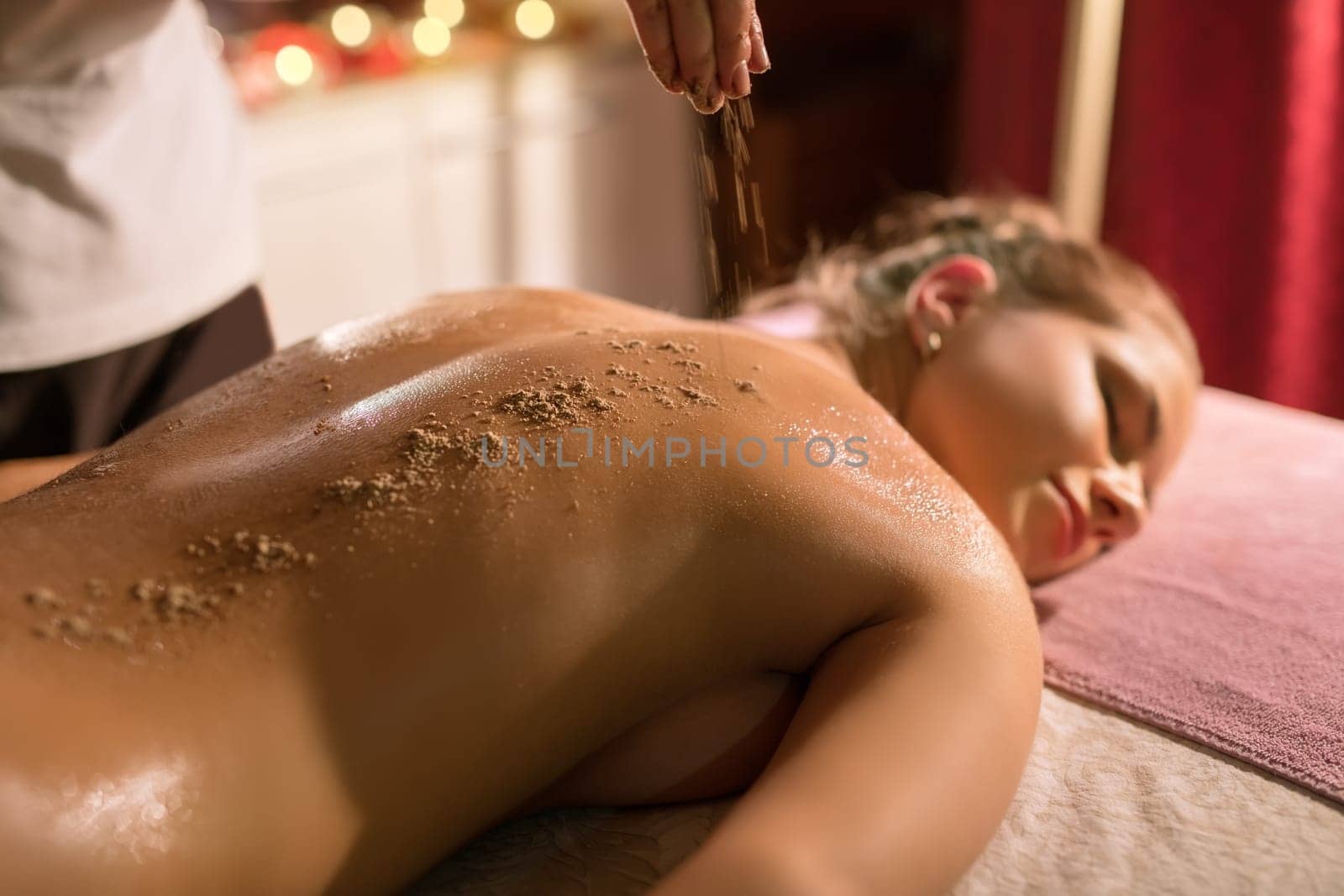In spa salon. Photo of procedure massage and scrub