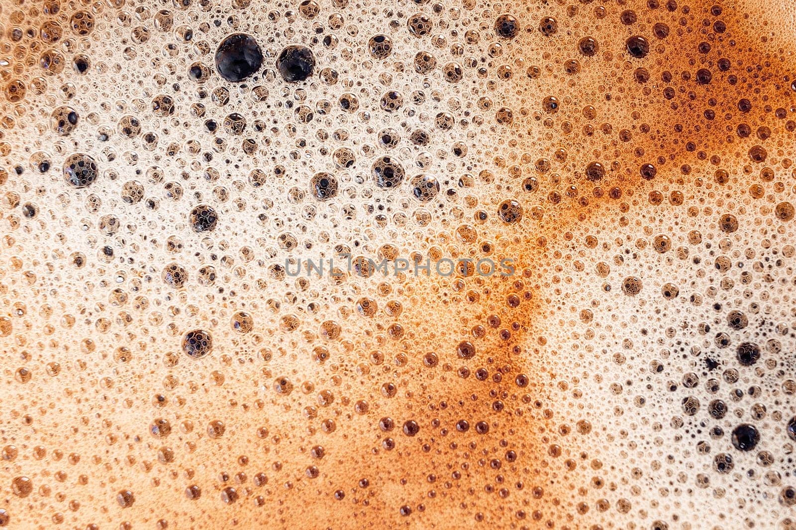 Coffee foam close up. Macro texture and background.