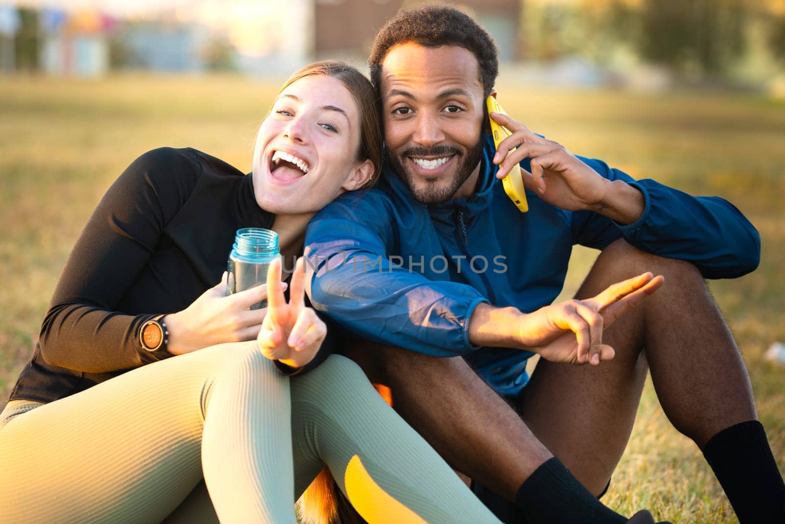 Young athletes smiling looking at camera. by molesjuny