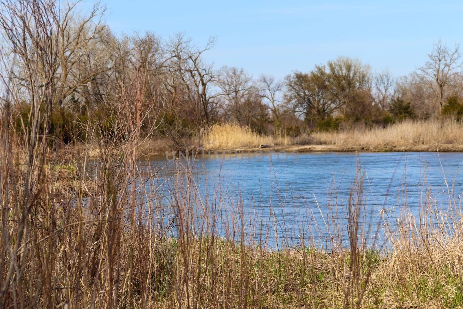 River flowing the Platte river in Nebraska by gena_wells