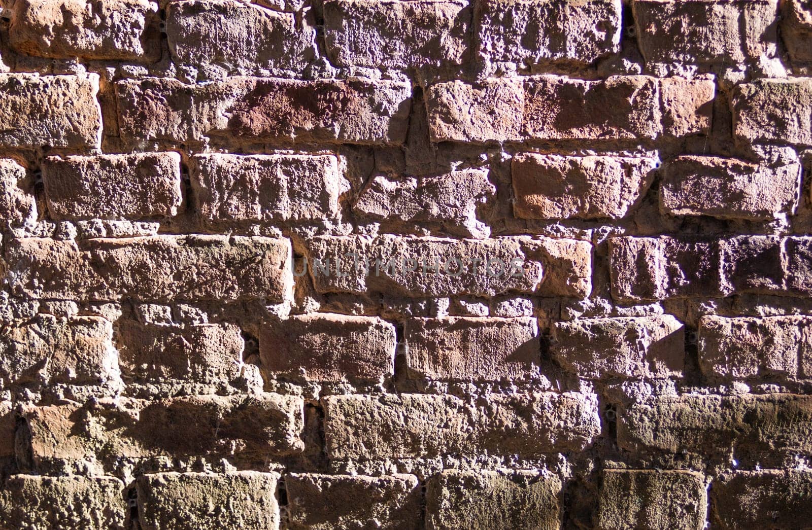 Horizontal view of empty, old, red brick wall background with copy space