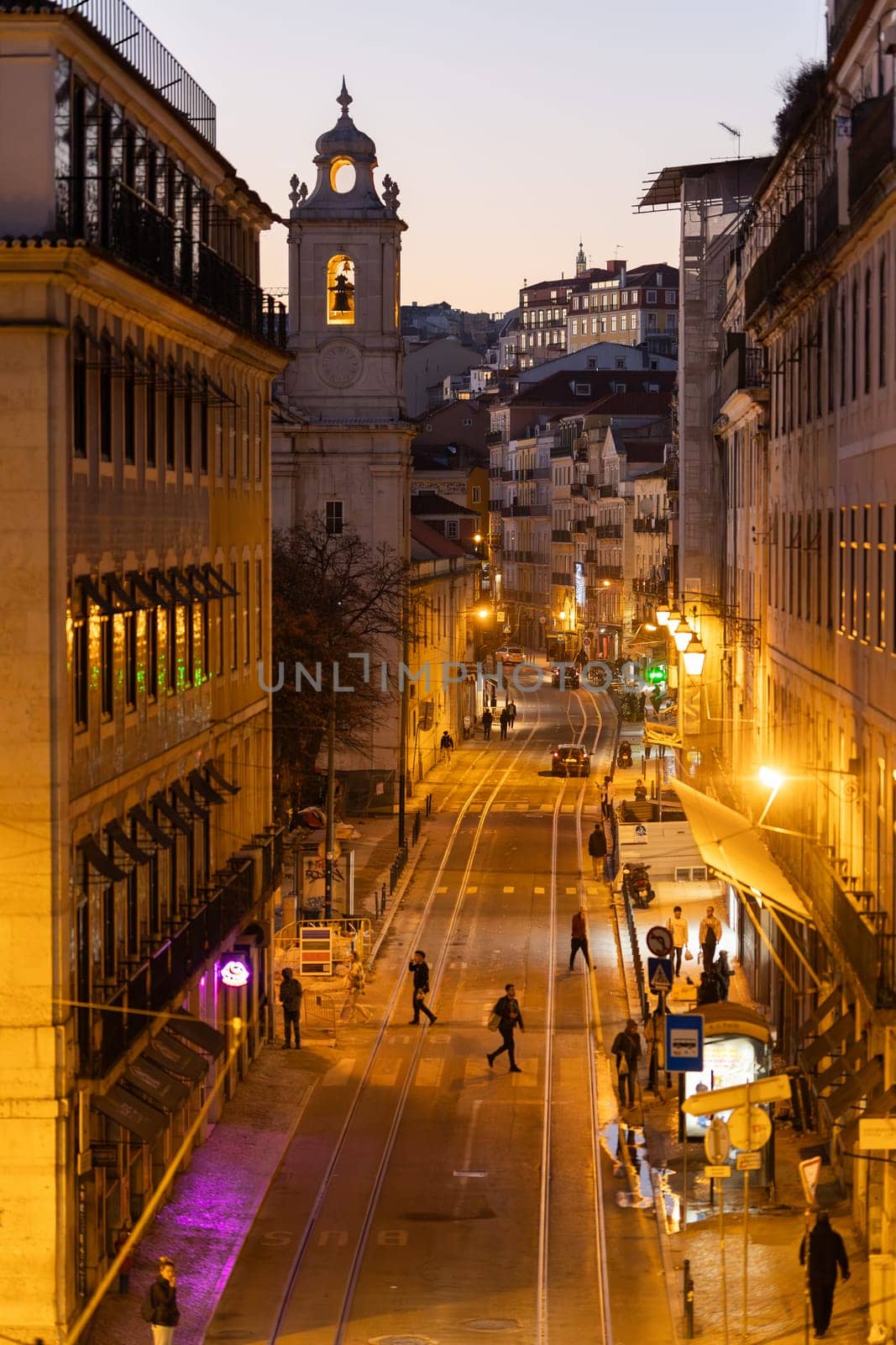 17 december 2023, Lisbon. Portugal - Rua de S. Paulo - view of night city with crowd - telephoto shot