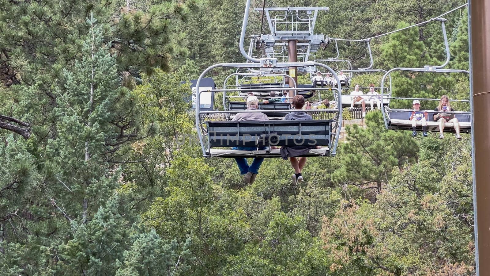 Colorado Springs, Colorado, USA-August 17, 2022-Ski lift ride at the Cheyenne Mountain Zoo during the summer.