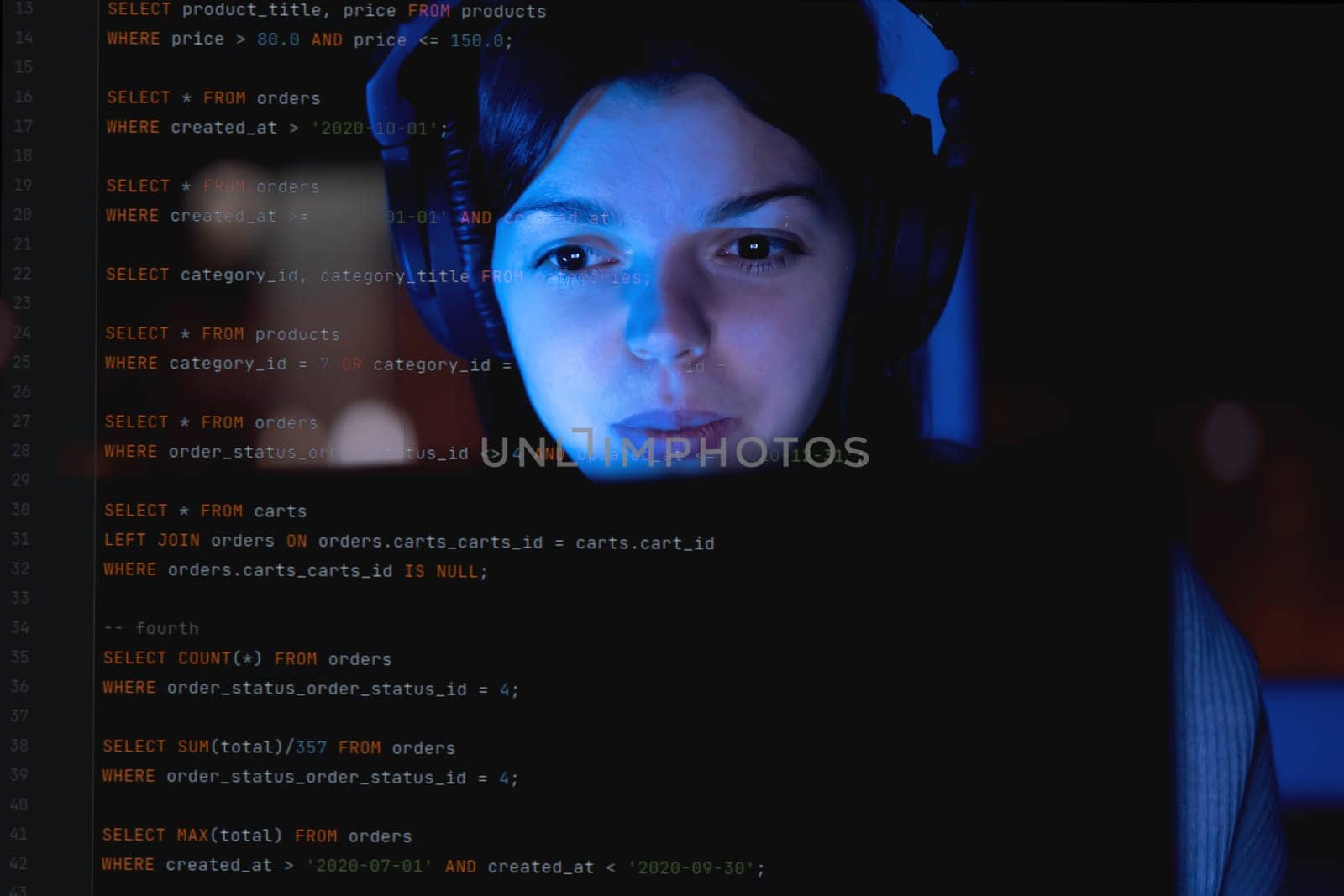 A young girl works on a laptop late at night online, a woman is coding, writing a program, using her device to create a new project and e-learning, getting an IT education for future development.