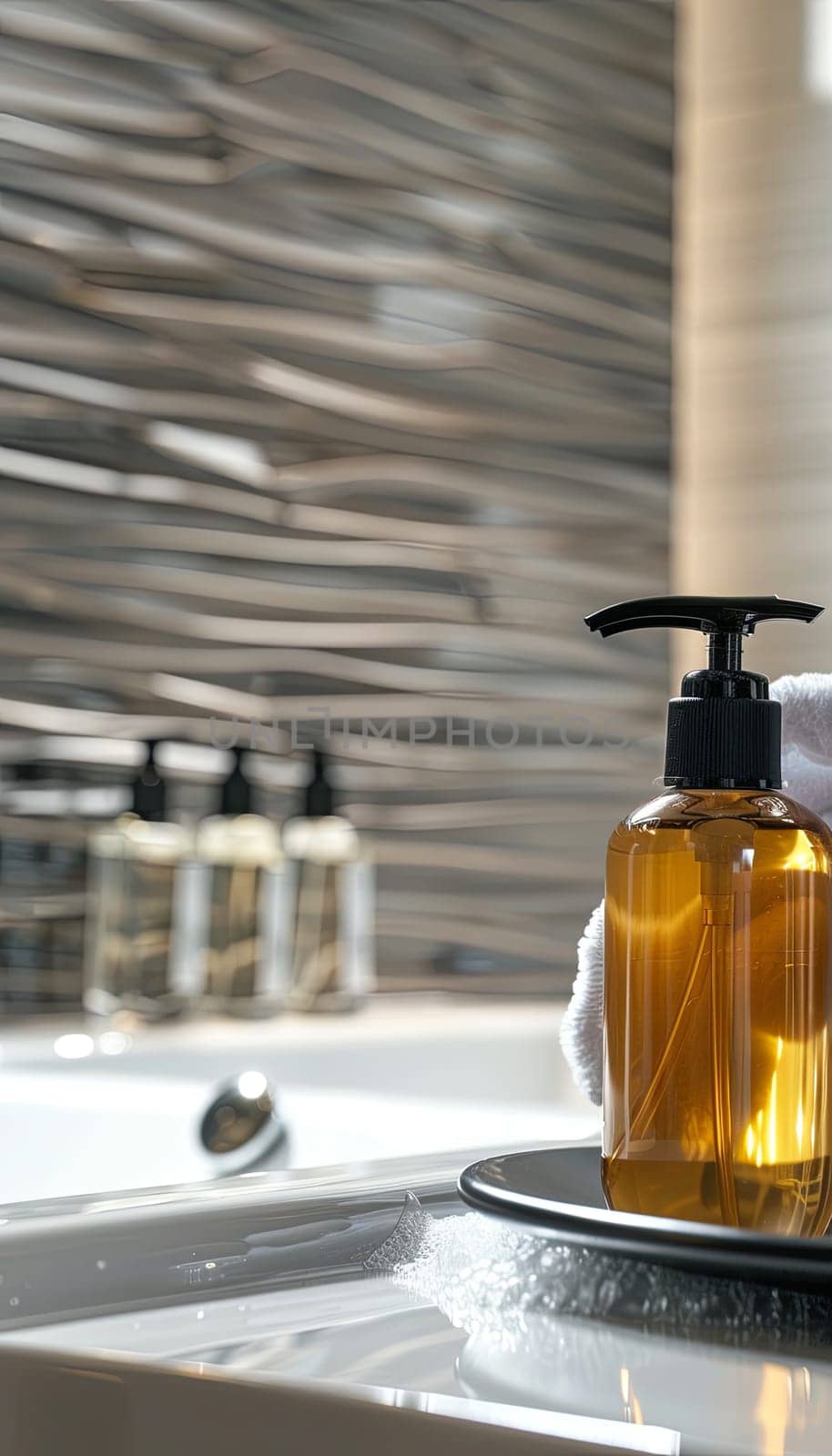 Closeup of stylish shampoo and conditioner bottles in a modern bathroom setting.