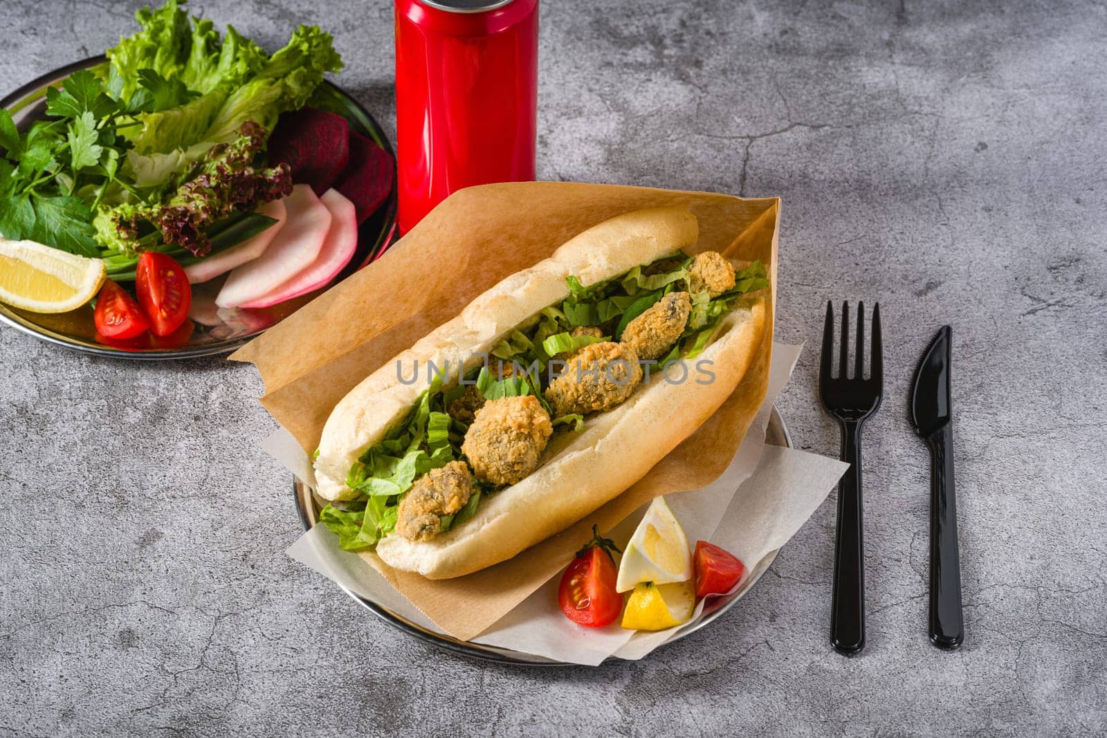 Deep fried mussels in bread and with greens on the side. Turkish name Midye Tava