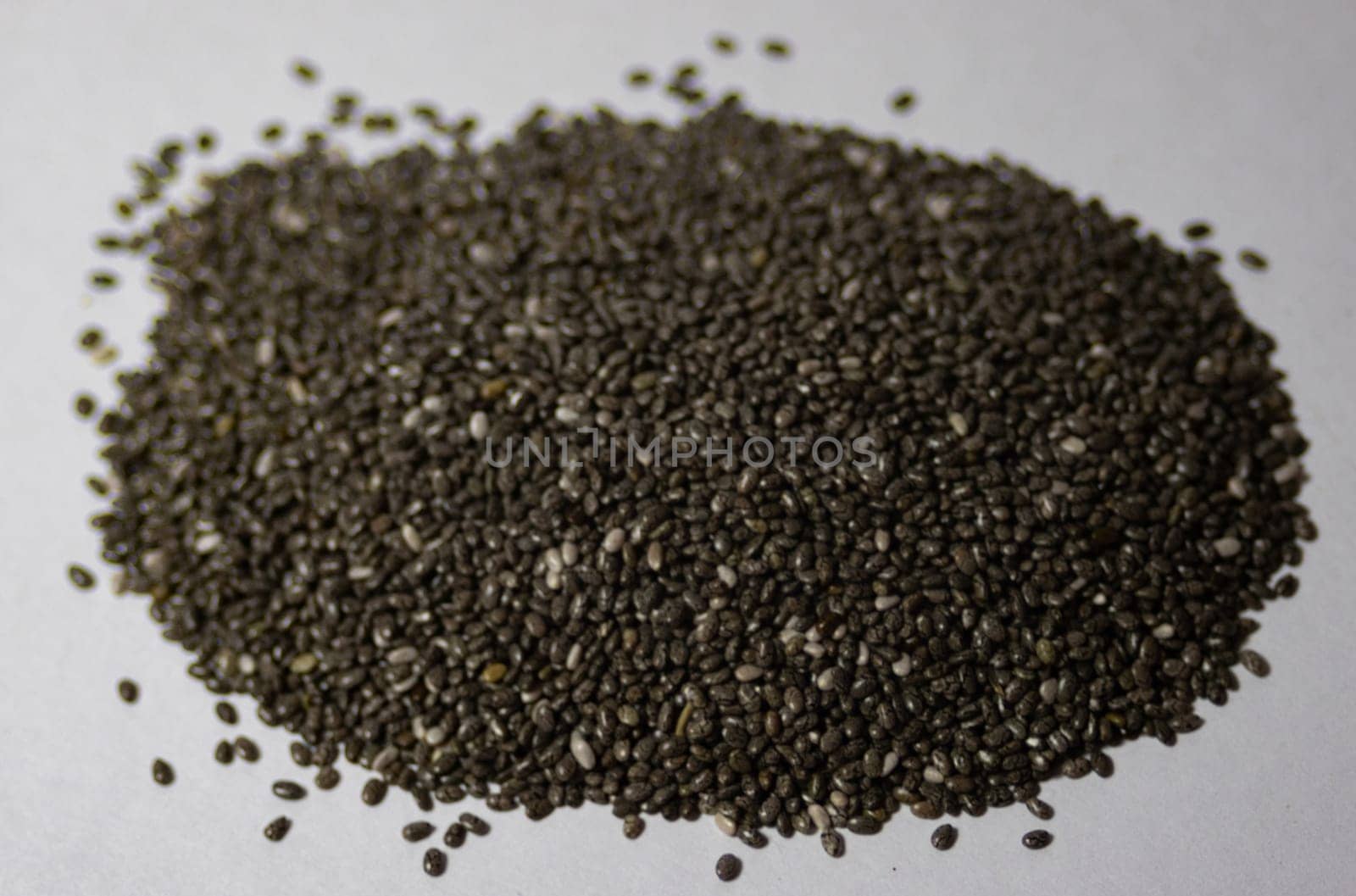 Close-up horiuzontal photo of chia seeds. Source of protins for vegetarian diets. Ideal for vegans