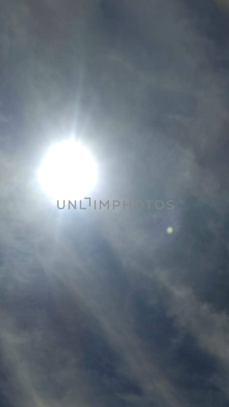 sun sky clouds rays of light background nature. High quality photo