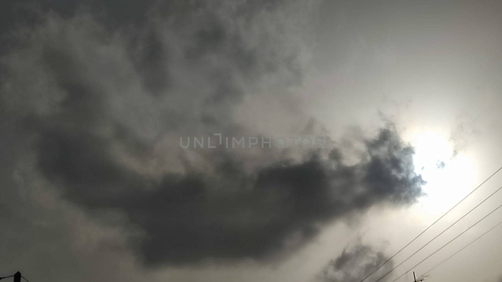 gray sky, clouds white sun, nature weather air background. High quality photo