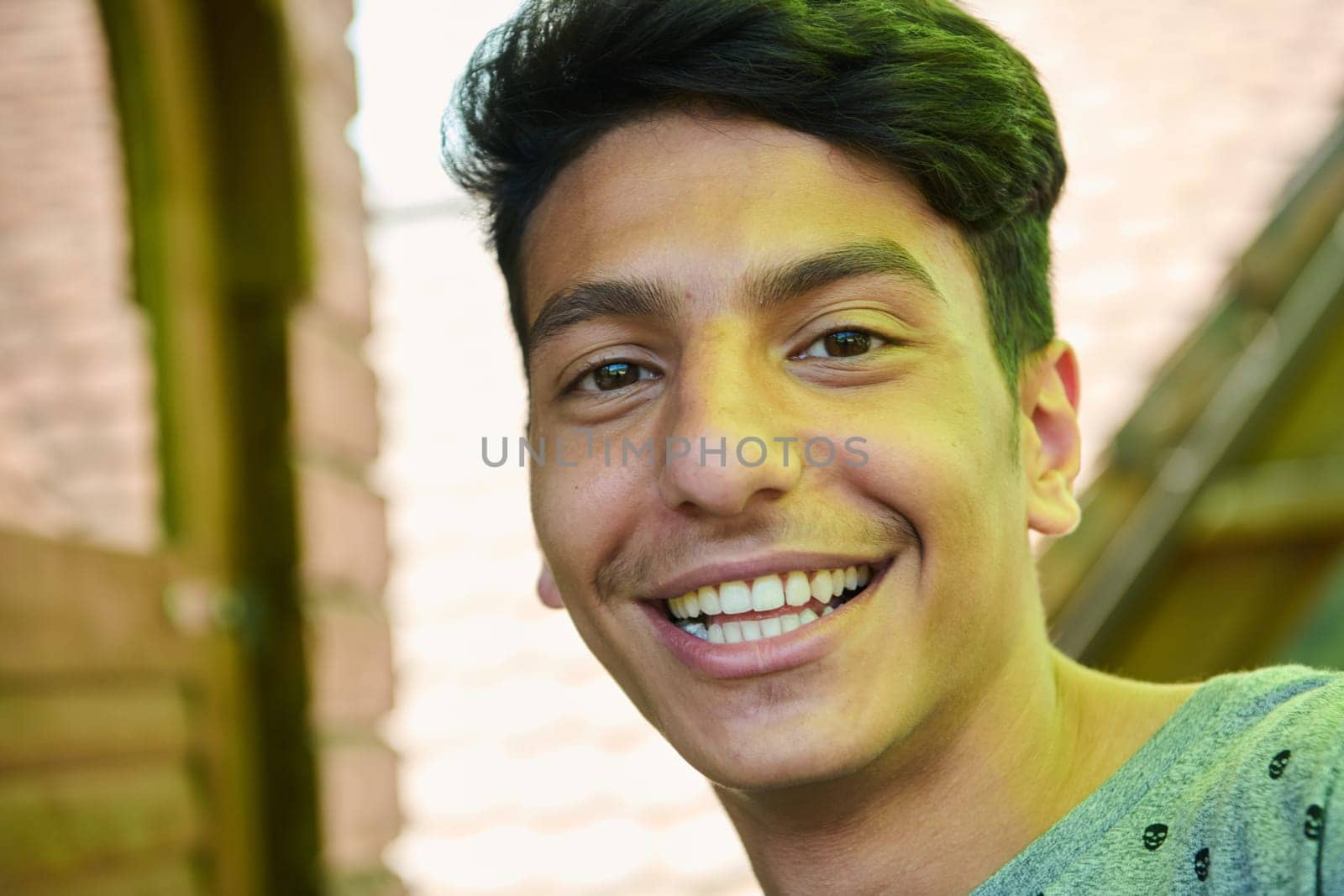 Middle Eastern Man with a Radiant Smile and Beautiful White Teeth Captured in Closeup by dotshock