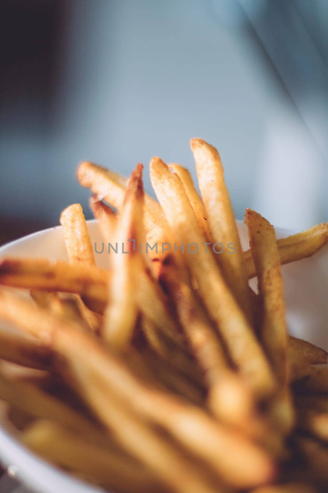 rustic food and homemade cooking styled concept - just cooked french fries served, elegant visuals