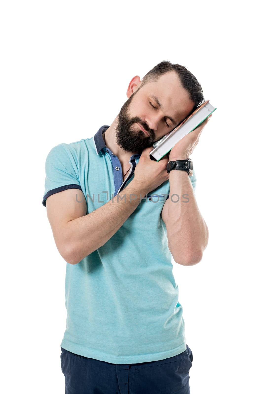 Image of bearded man fell asleep while reading boring book
