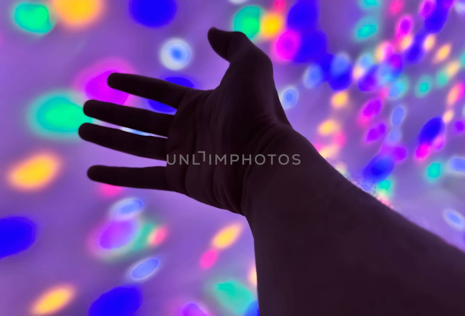 Hand gesture silhouette on a colorful background reaching out, saying hello, and show number represent for multimedia content creation
