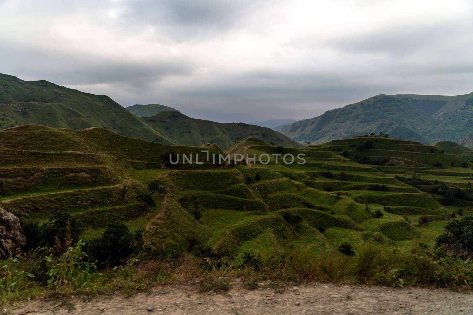 Chokhsky terraces Dagestan. Landscape of mountainous Dagestan with terraced fields and peaks mountains in the distance