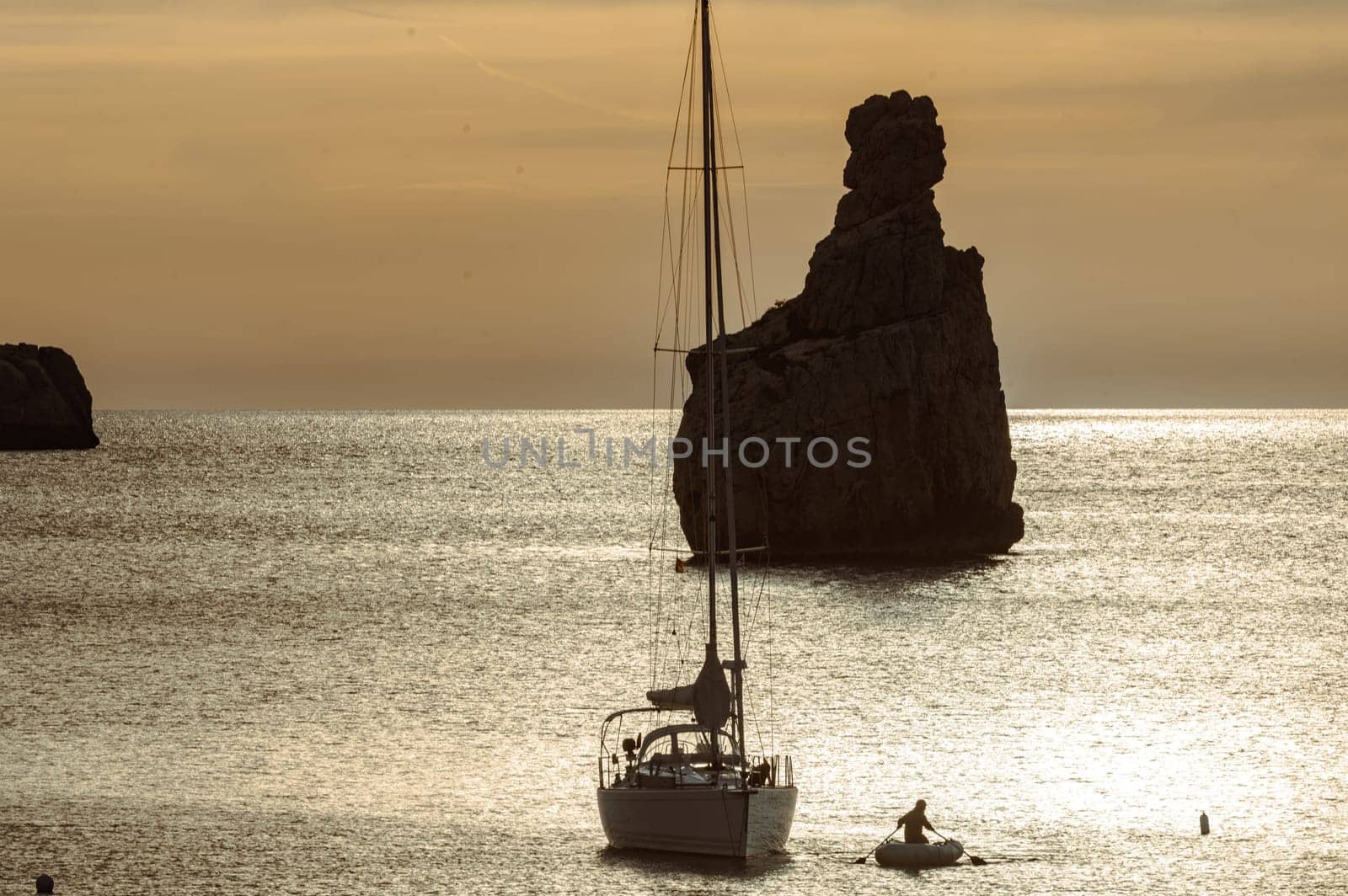 Sunset on Benirras beach in Ibiza in summer.