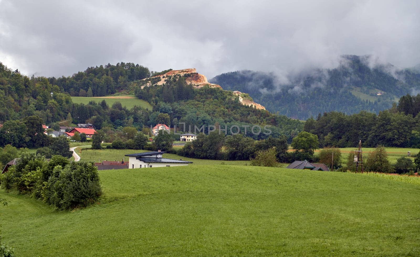 Village with mountains chalets amongst fields and pastures in Carpathians ridge in Slovakia. Travel destinations. Tourism and trip concept. Rural scene. Discovering the beautiful nature in Slovakia