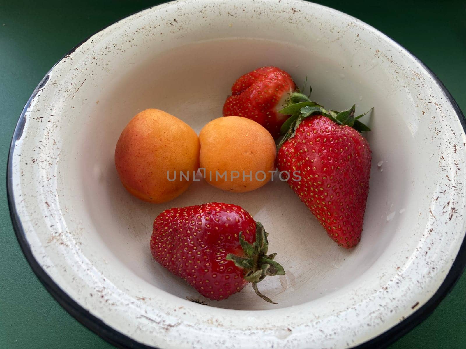 Young large strawberries grew in the village by architectphd