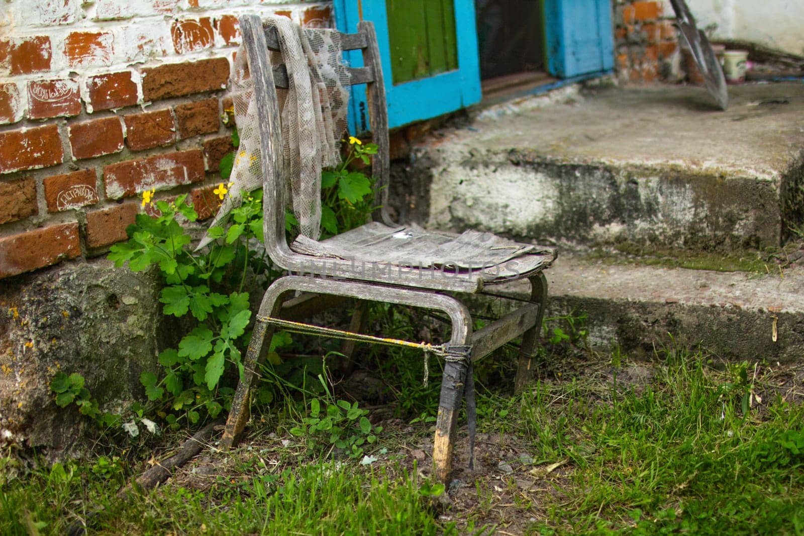 An old chair in an abandoned house. High quality photo