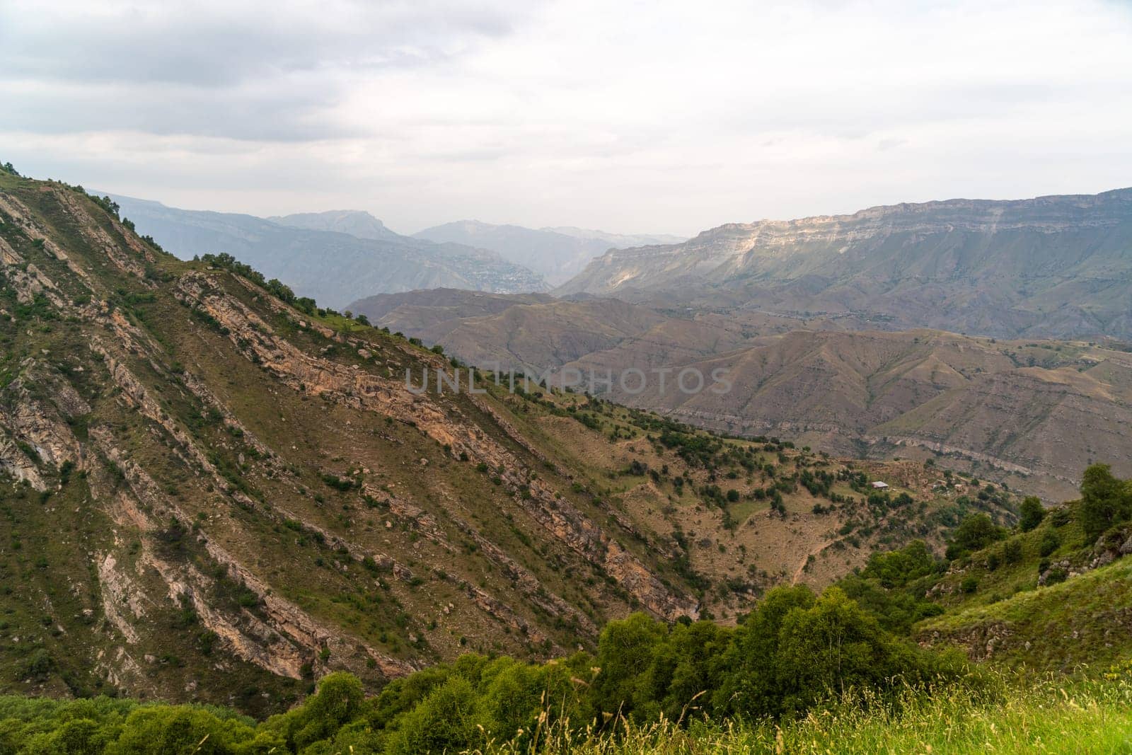 Caucasian mountain. Dagestan. Trees, rocks, mountains, view of the green mountains. Beautiful summer landscape