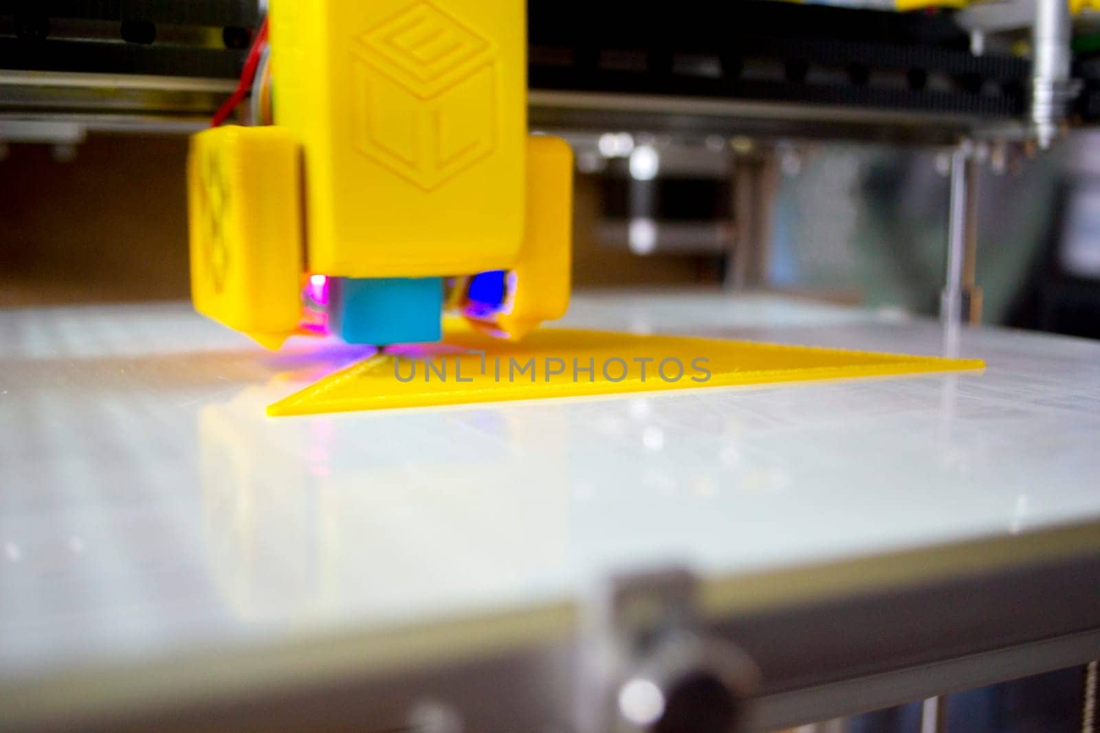 3D printer printing model. Equipment of 3D printer during process of printing by Mari1408