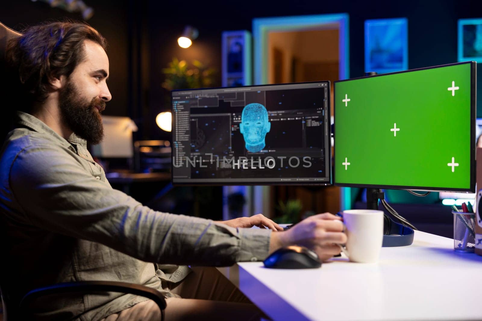 Programmer being greeted by awaken AI gaining consciousness on chroma key computer monitor. Man communicating with artificial intelligence through green screen desktop PC