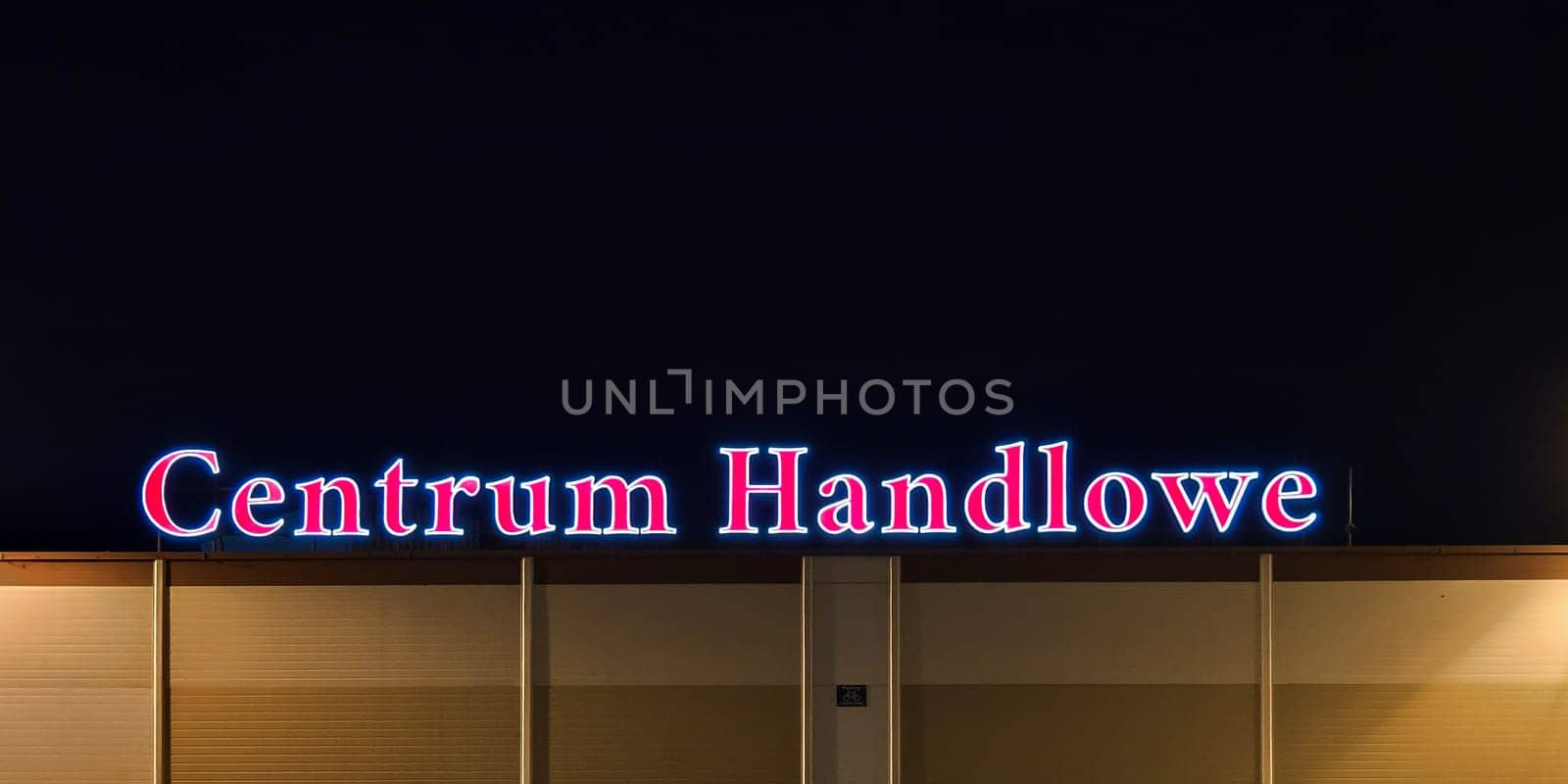 Neon Shopping Center Sign at night Neon in Polish language - Centrum Handlowe