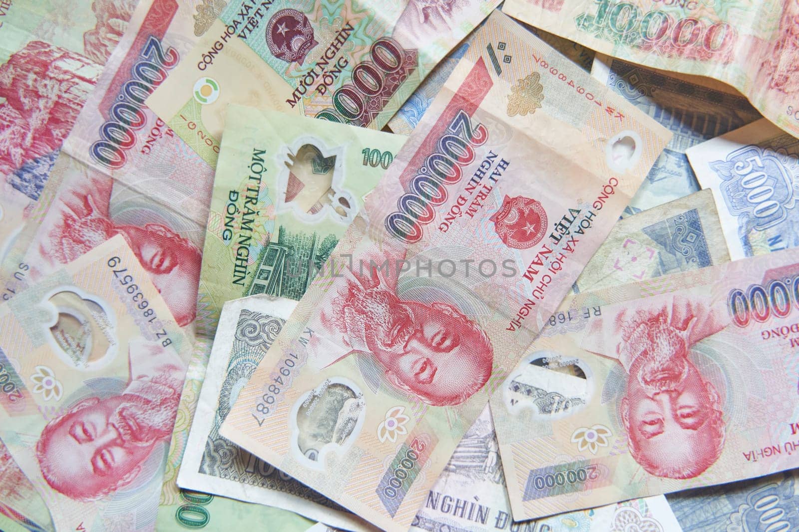 Vietnamese dong banknotes close-up. Money background. Vietnamese currency - dongs. Pattern texture and background of Vietnam dong money.