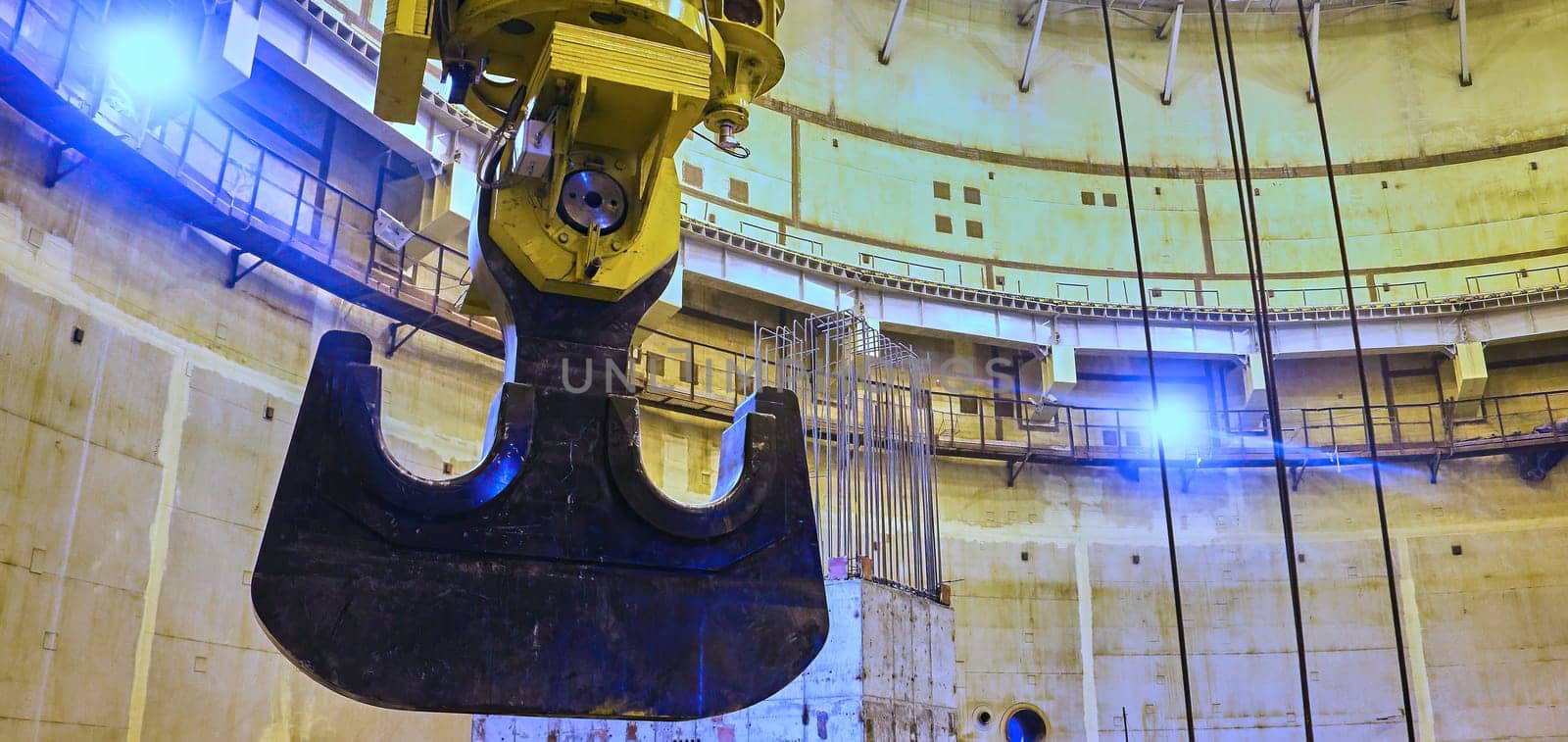 Industrial Crane Hook Suspended Inside a Concrete Structure by Hil