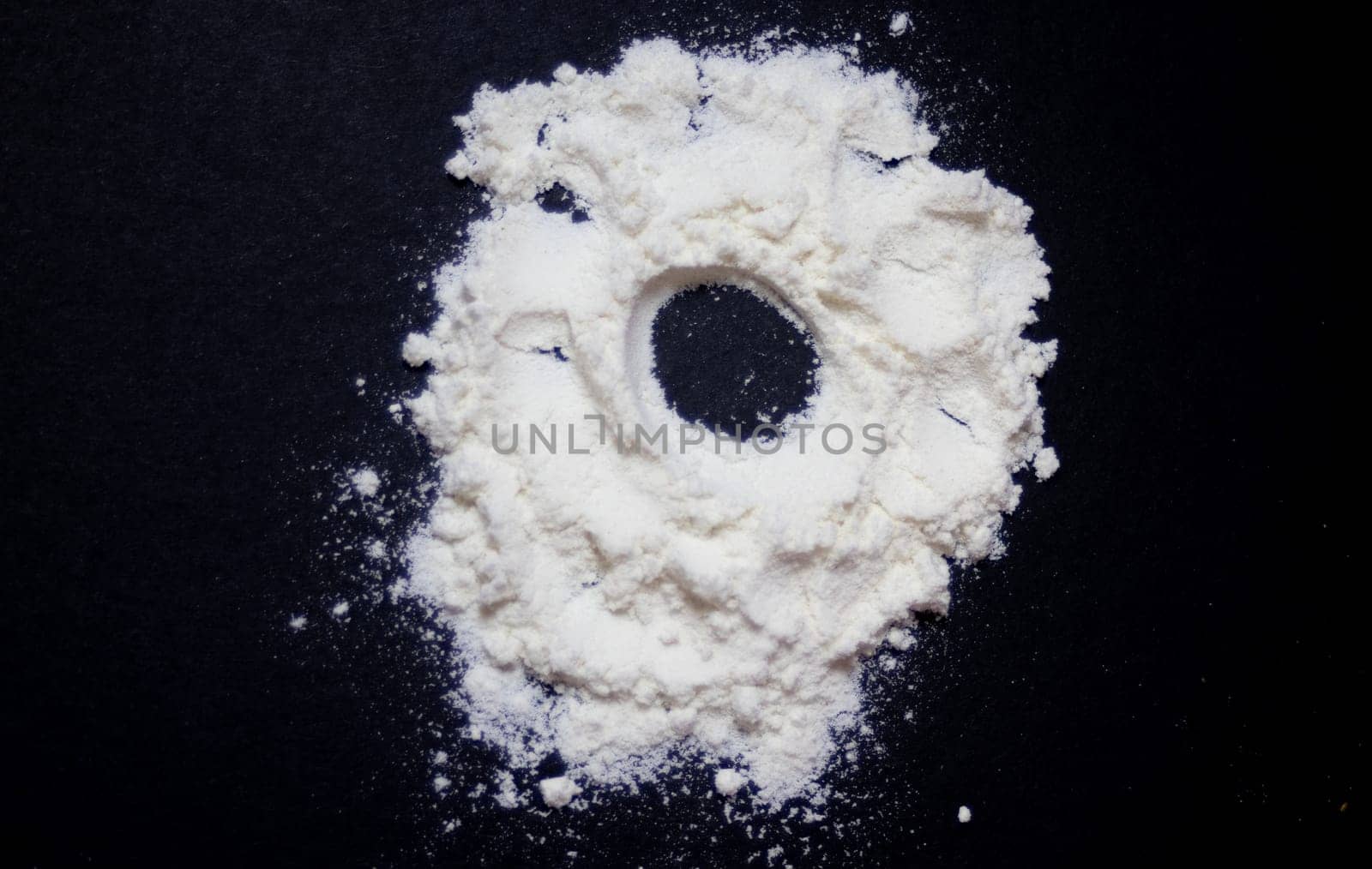 Stack of white flour isolated with a hole in the middle. Graphic resource by VeroDibe