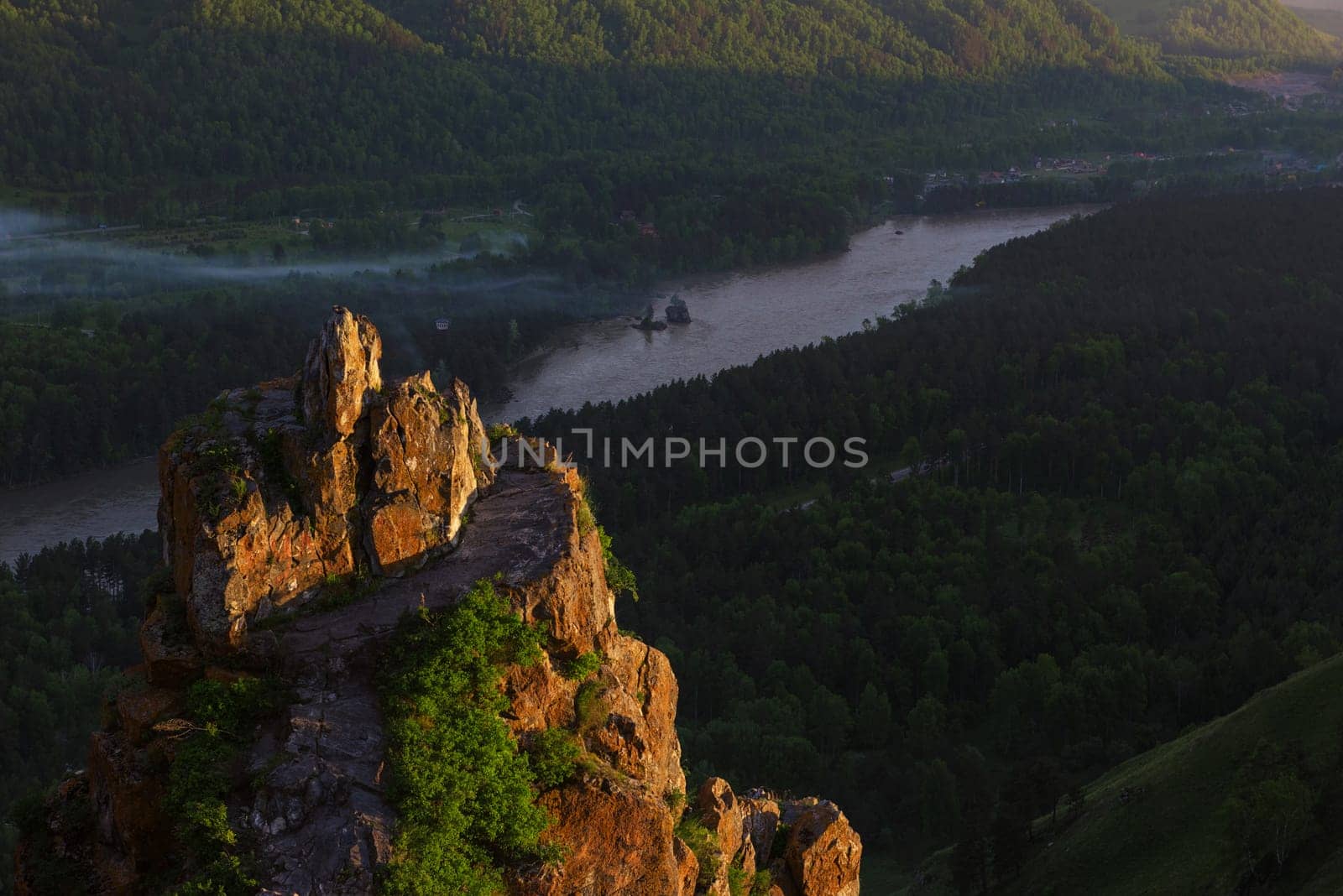 Beauty dawn on the peak, in the mountains in Altay