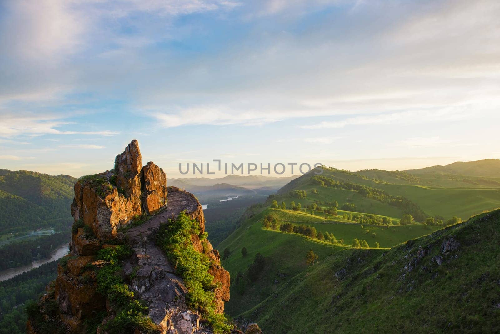 Beauty dawn on the peak, in the mountains in Altay