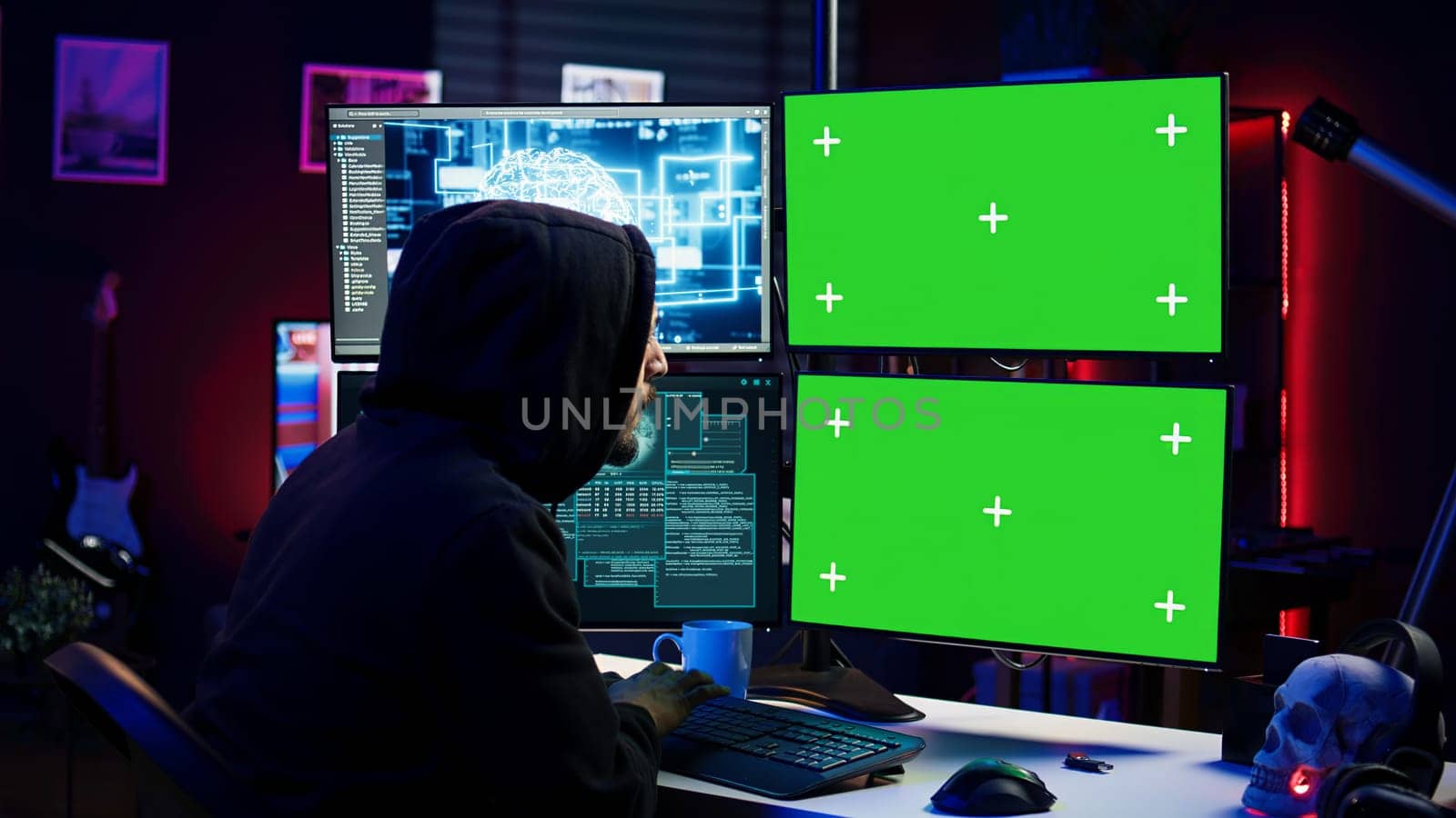 Hacker using AI and green screen computer monitors to produce malicious malware corrupt company data. Evil man working on mockup desktop PC using artificial intelligence, infecting systems, camera B