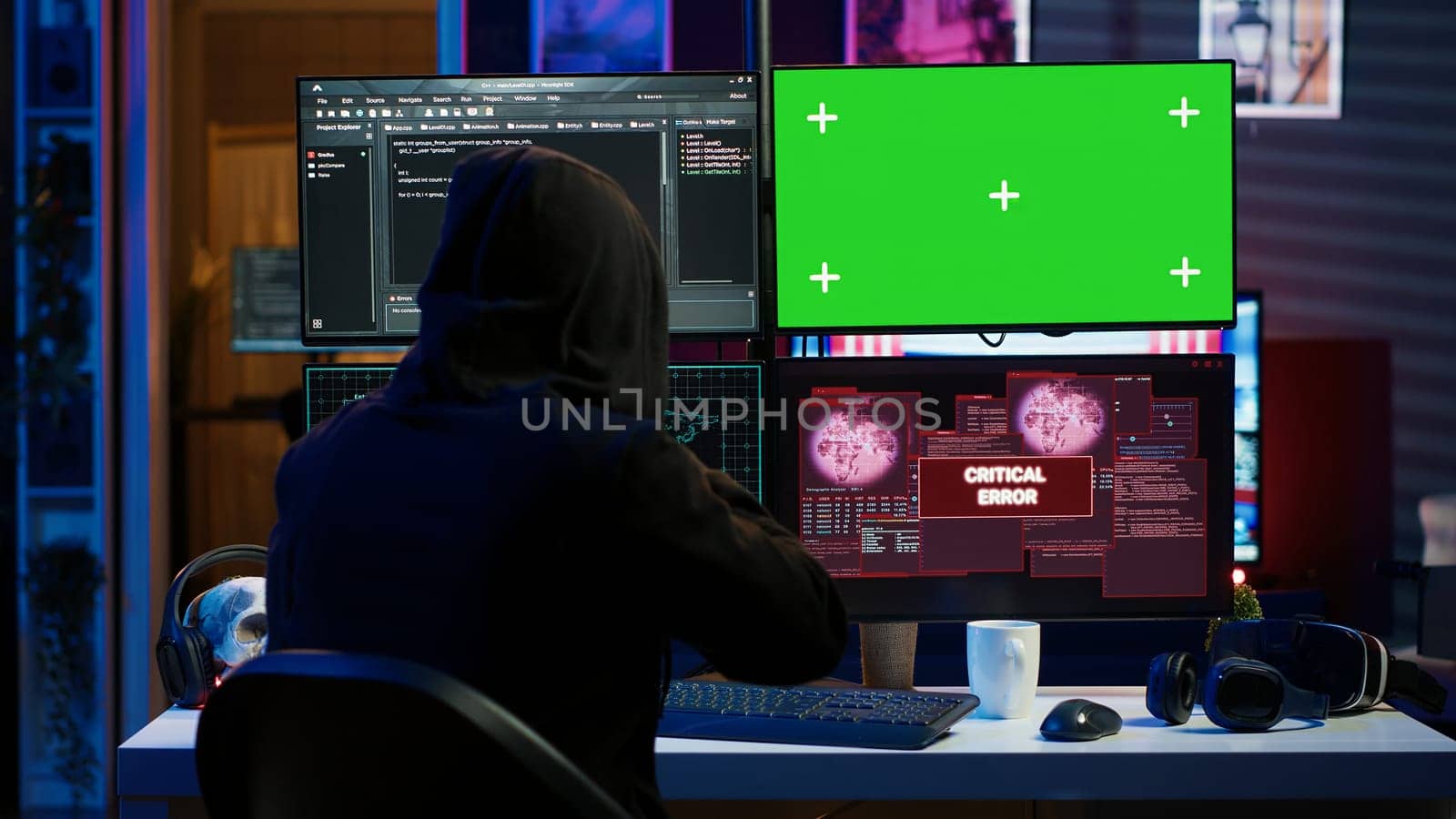Rogue programmer using green screen PC to hack firewalls, getting attacks rejected by cybersecurity. Scammer using mockup monitor seeing access denied error message while committing fraud, camera A