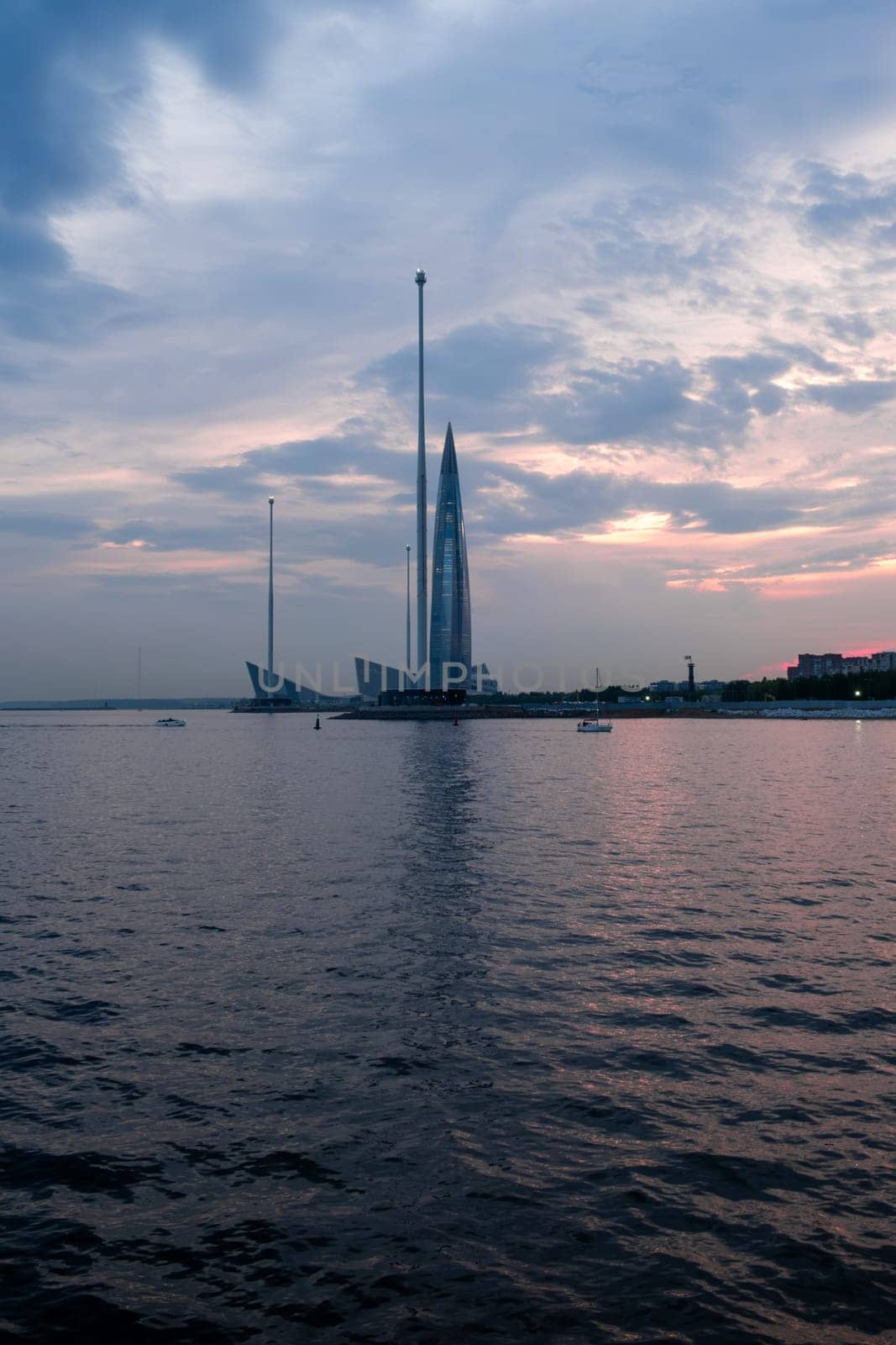 St. Petersburg, Russia, 05.25.2024. View of Lakhta Center skyscraper at sunset. by OlgaGubskaya