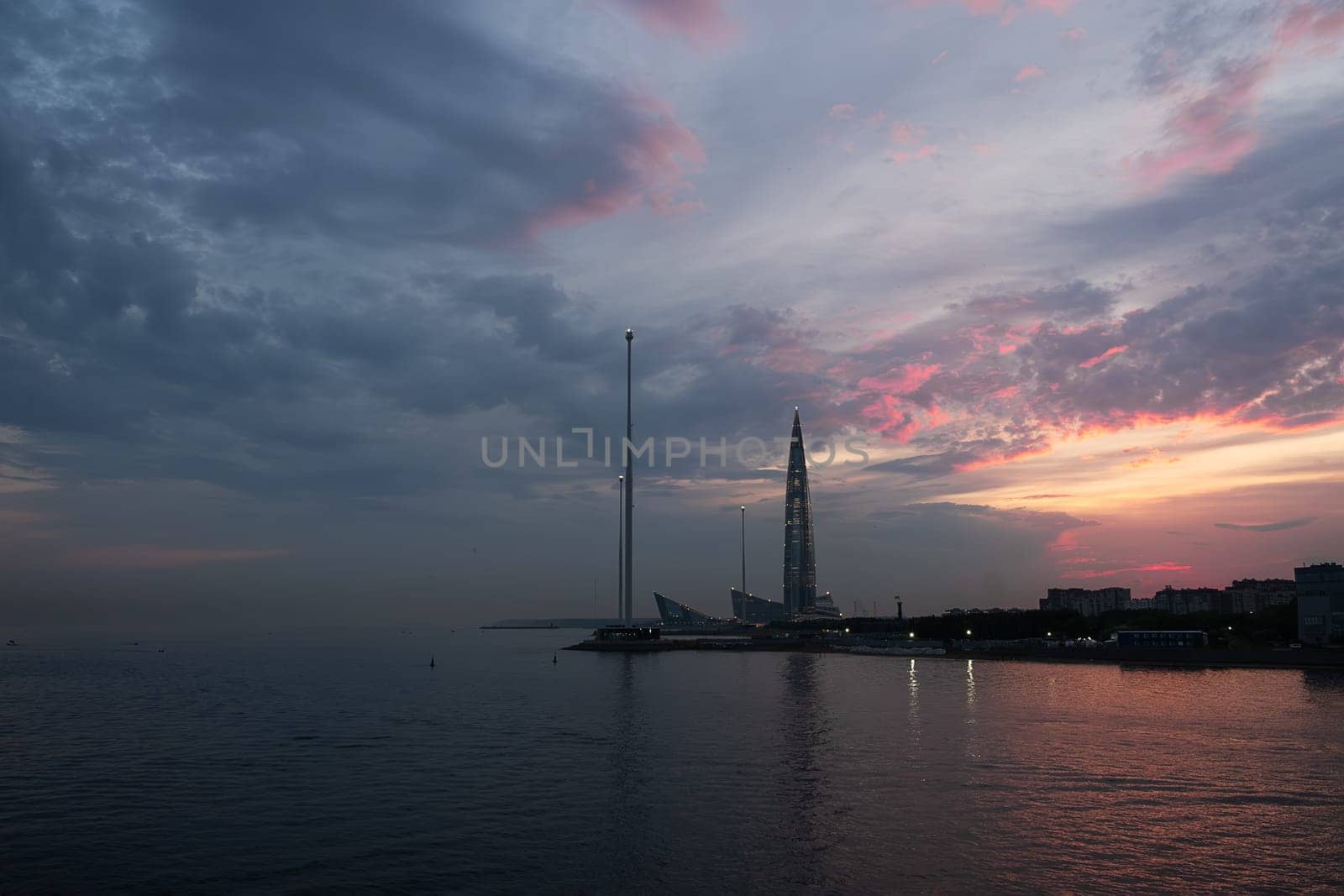 St. Petersburg, Russia, 05.25.2024. - View of the Lakhta Center skyscraper at sunset. Selective focus.