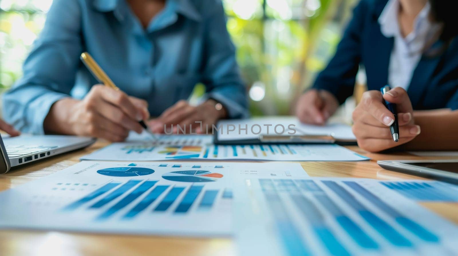 couple engaged in a discussion with a financial advisor about their retirement plans