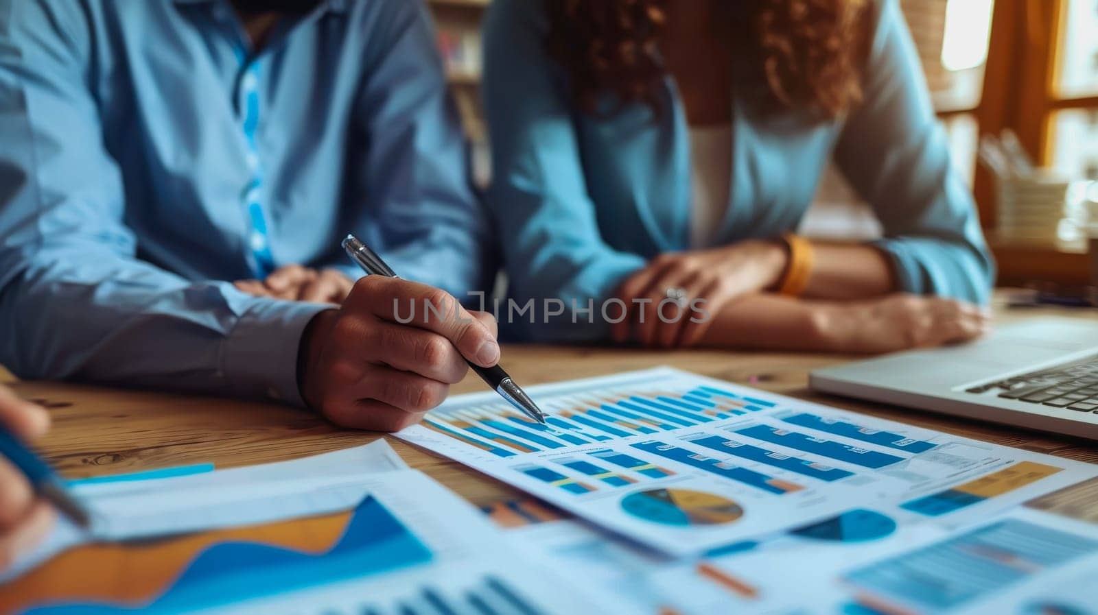 couple engaged in a discussion with a financial advisor about their retirement plans