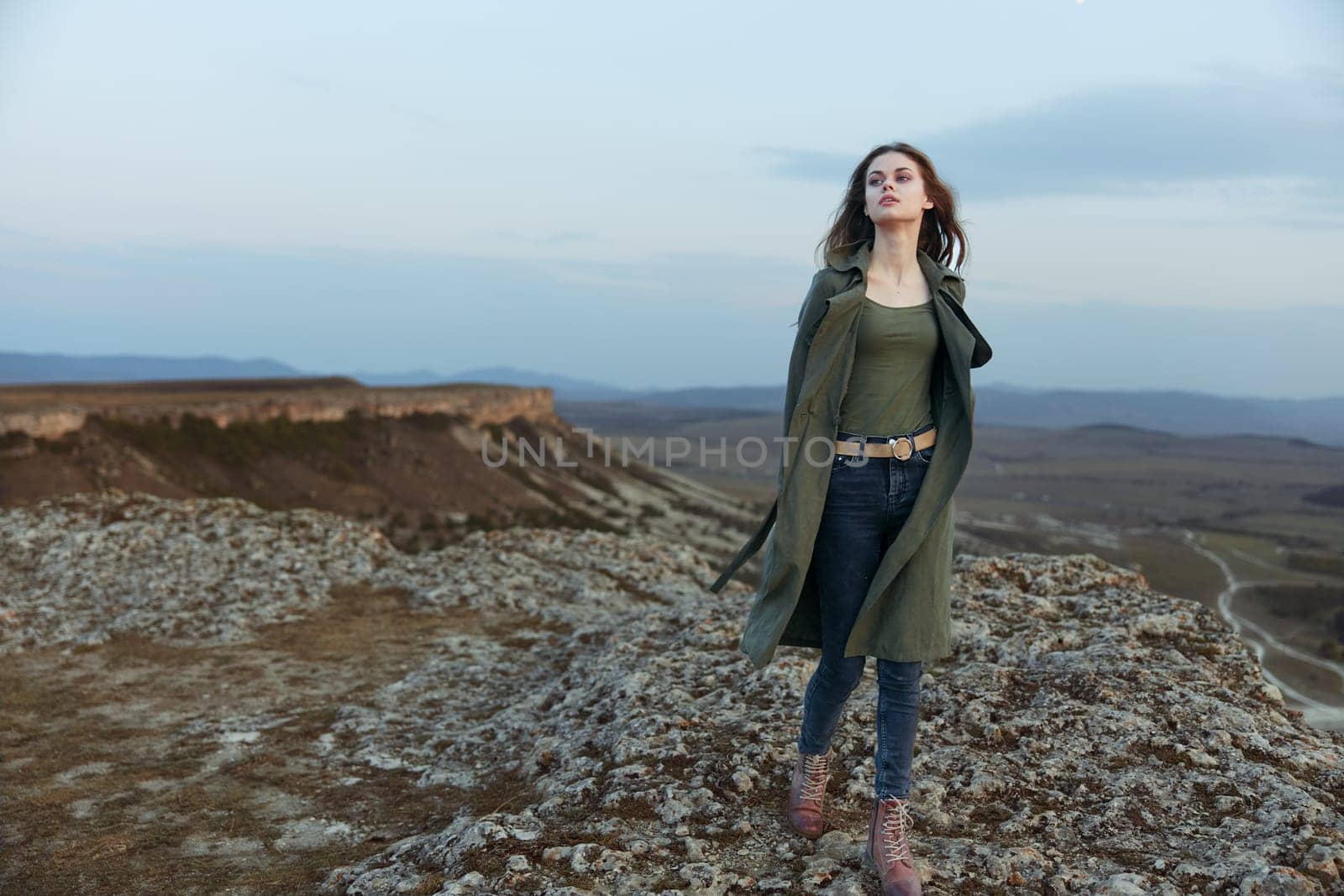 majestic moonlit view woman contemplating from mountain peak under full moon