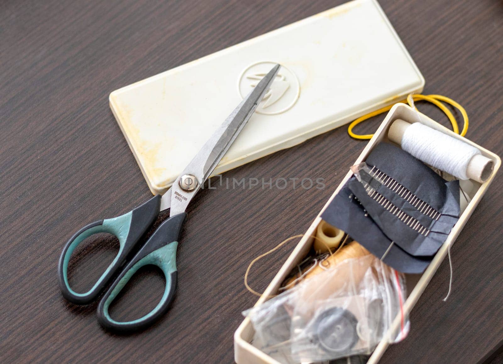 Close up shot of the box with sewing supplies