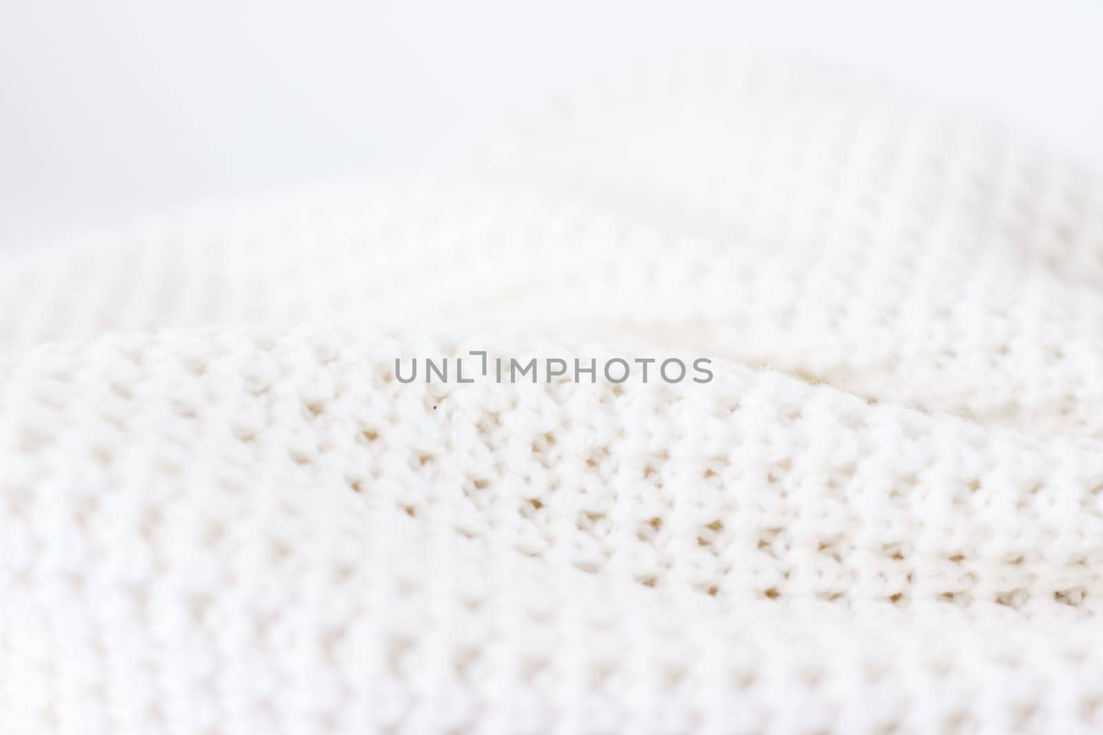 Warm knitted clothes, soft and white by Anneleven