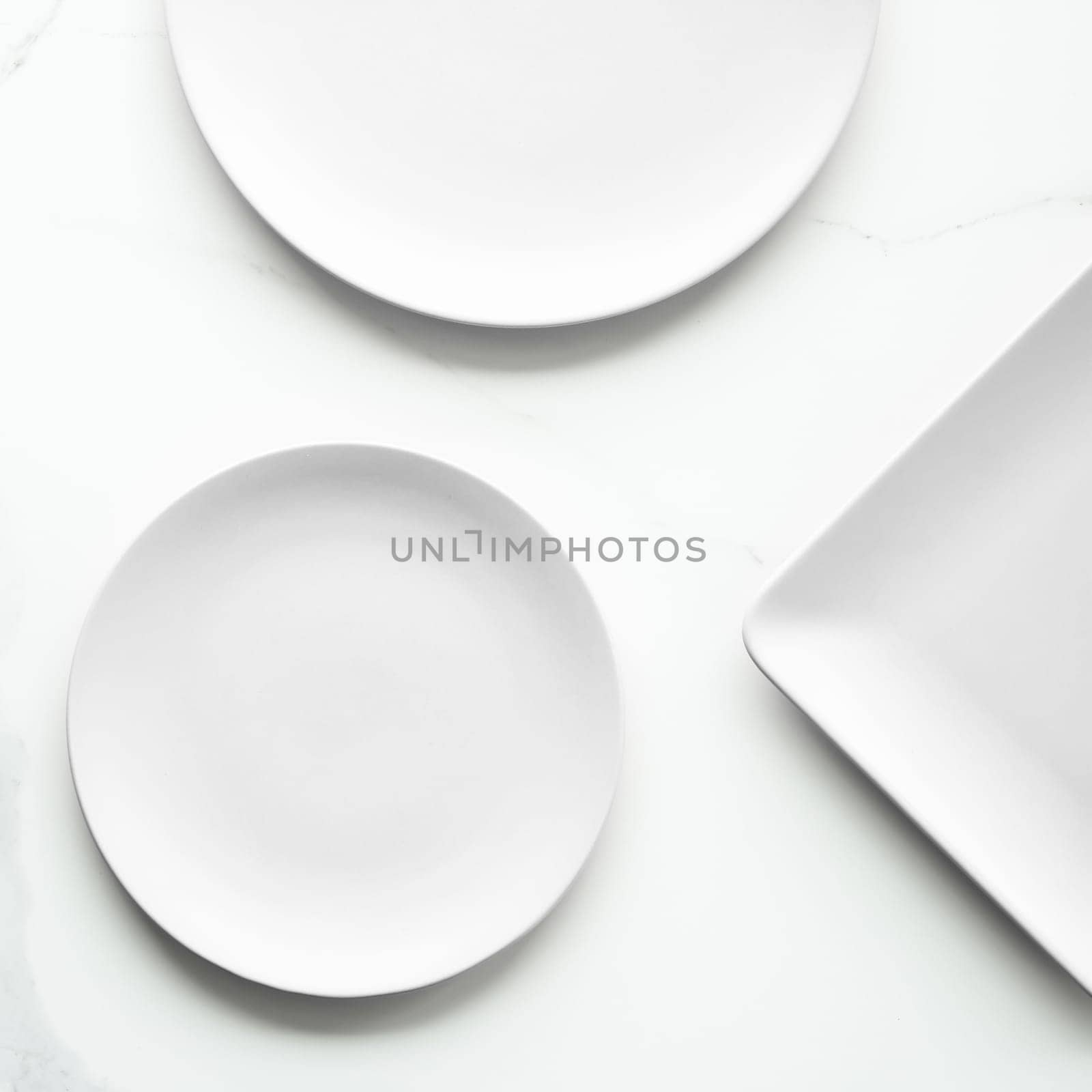 White empty plate on marble, flatlay - stylish tableware, romantic table decor and food menu concept. Serve the perfect dish