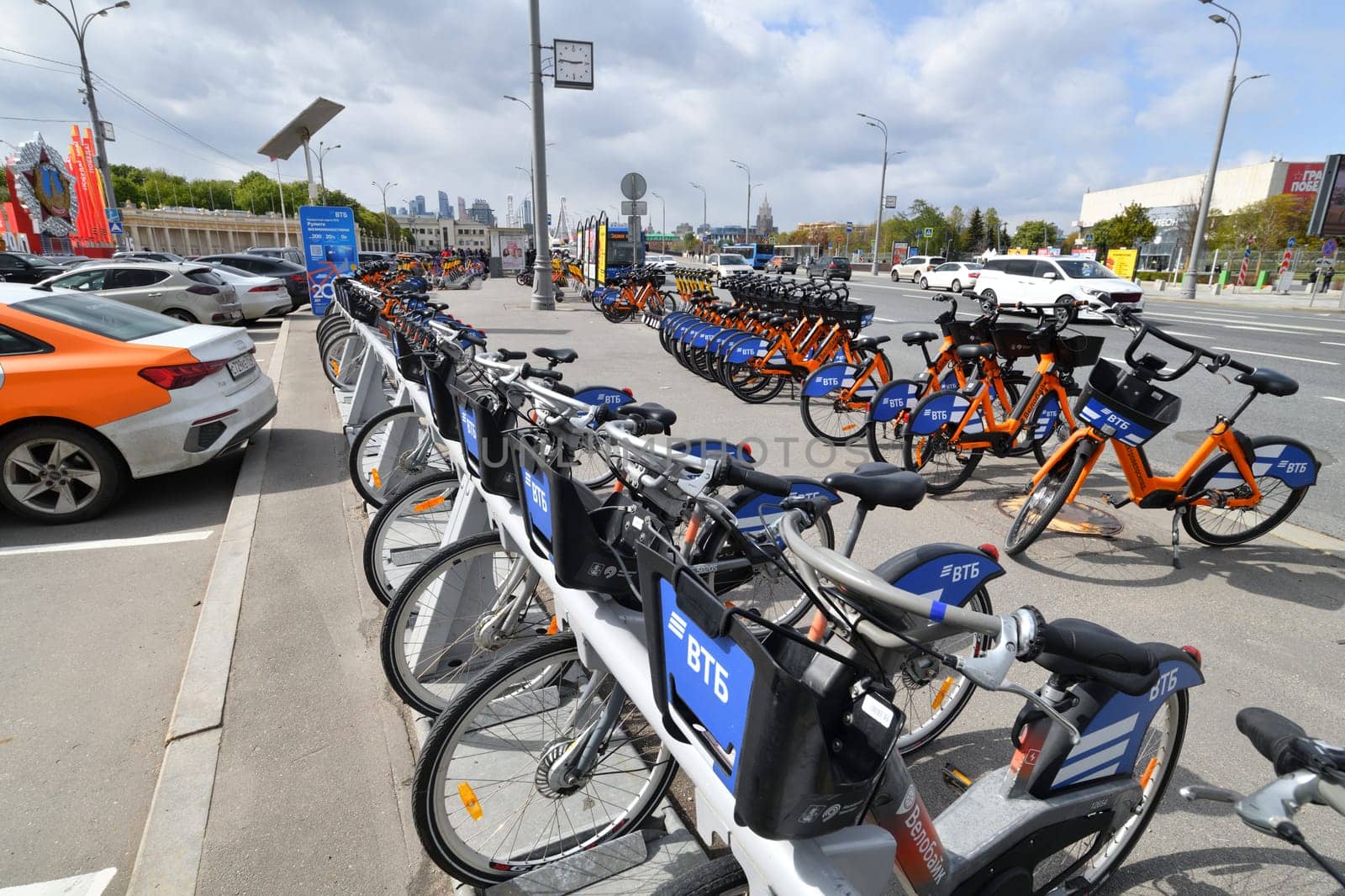 Moscow, Russia - May 9. 2024. Velobike - city bike rental with VTB Bank logo near Gorky Park by olgavolodina