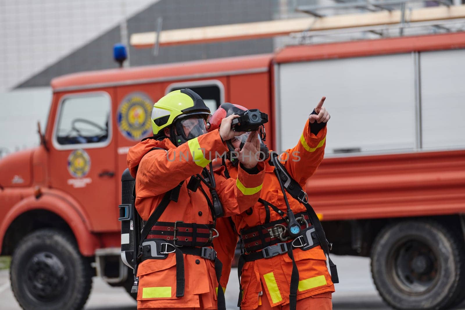 A group of firefighters undergoes training to learn how to effectively use a thermal camera in firefighting operations.