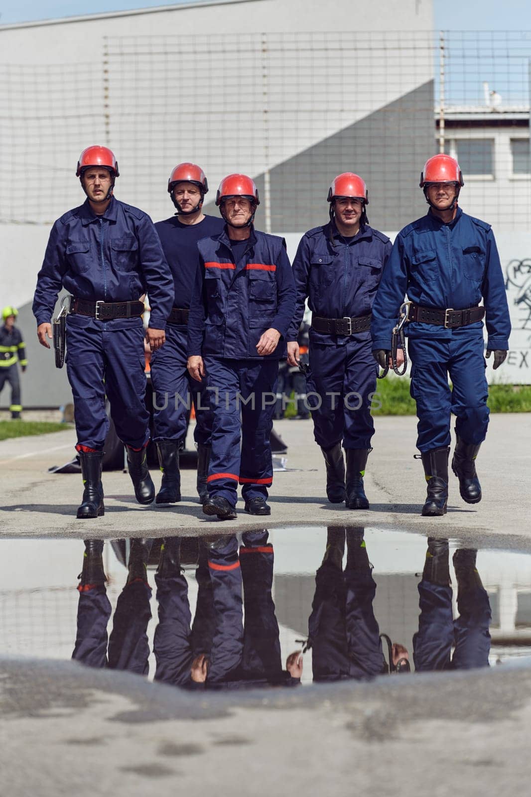 A team of confident and accomplished firefighters strides purposefully in their uniforms, exuding pride and satisfaction after successfully completing a challenging firefighting mission by dotshock