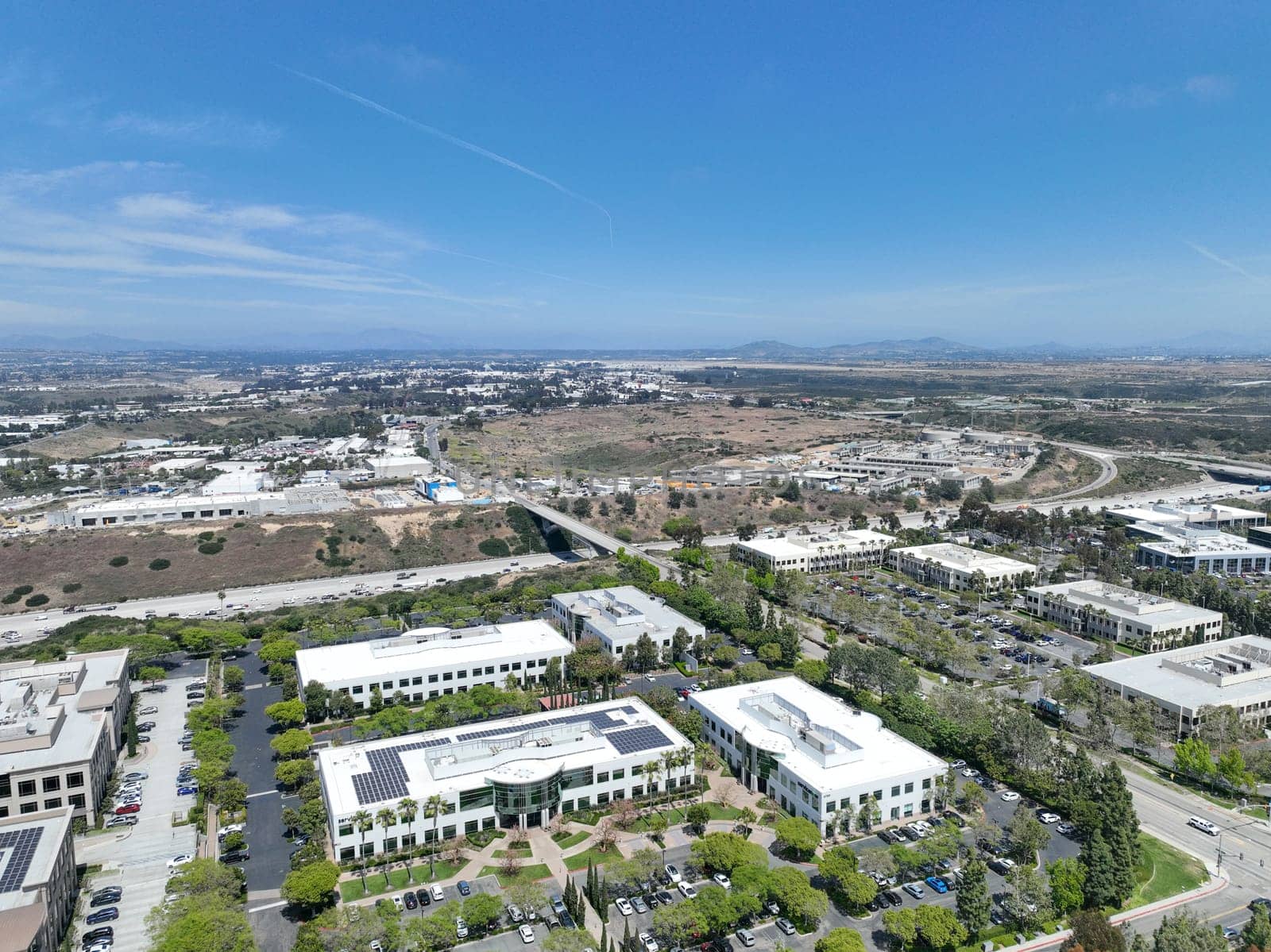Aerial view of business park with mixed use facility service building and offices in South San Diego, California, USA