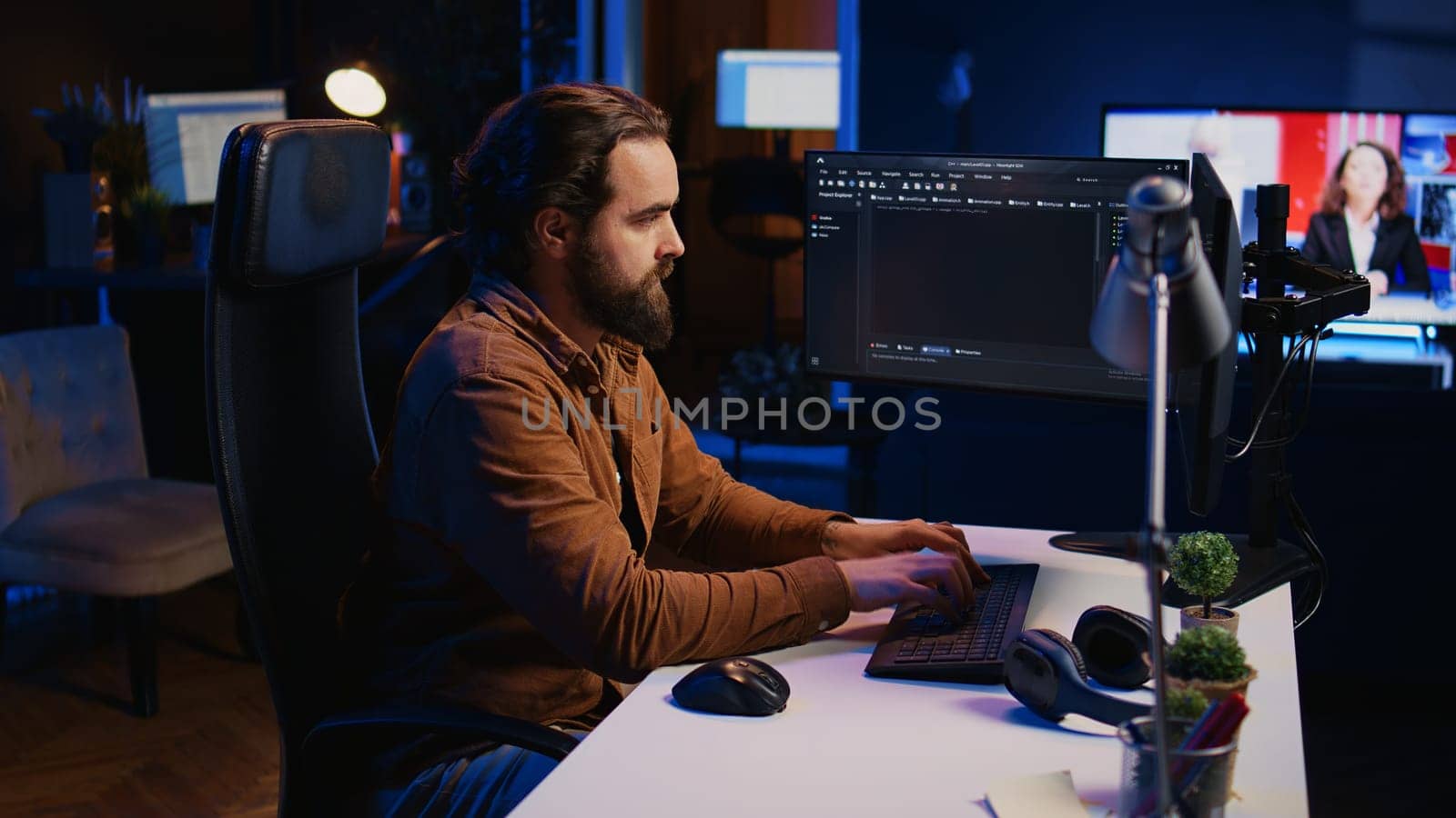 Computer engineer deliberating ways of fixing errors while developing code by DCStudio