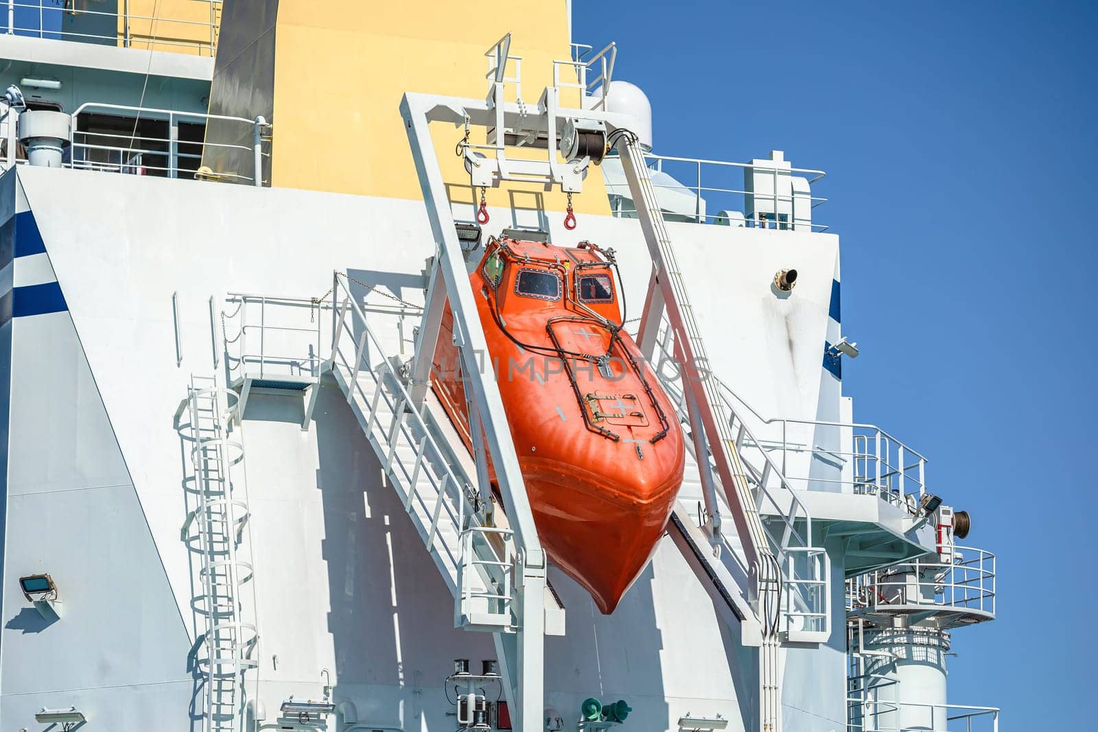 Lifeboat on large ship view, maritime safety equipment
