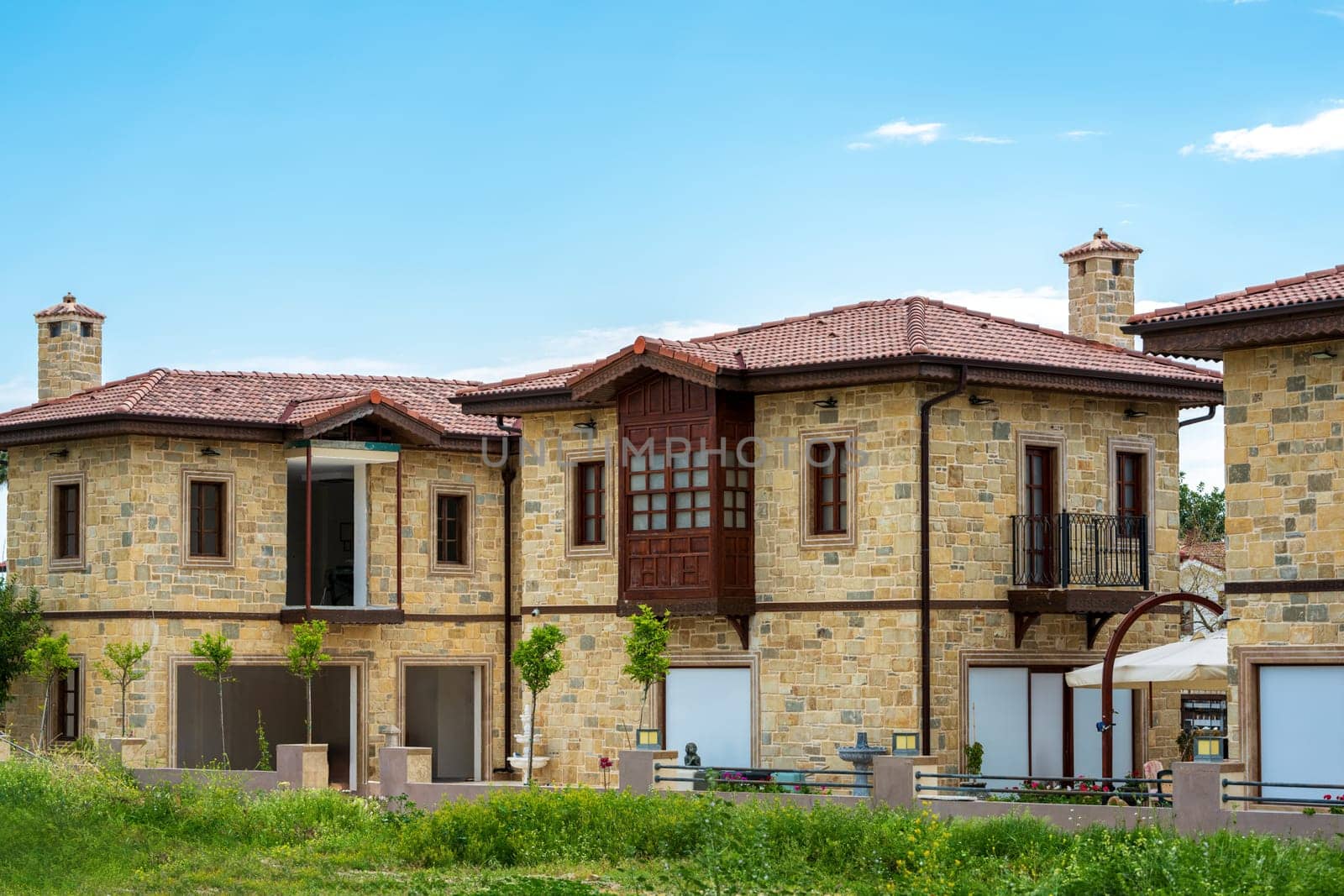 Restored houses with bay windows on the historical streets of Side Antalya