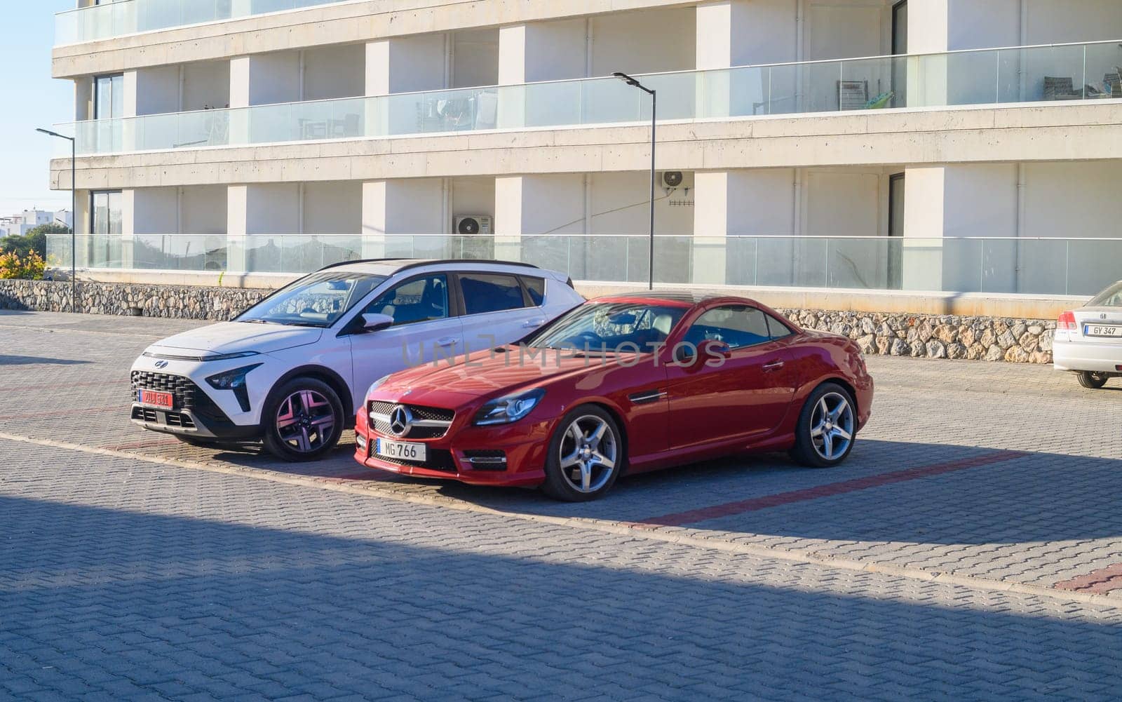 Gaziveren Cyprus 05.28.2024 -red Mercedes convertible SLK in the parking lot 1